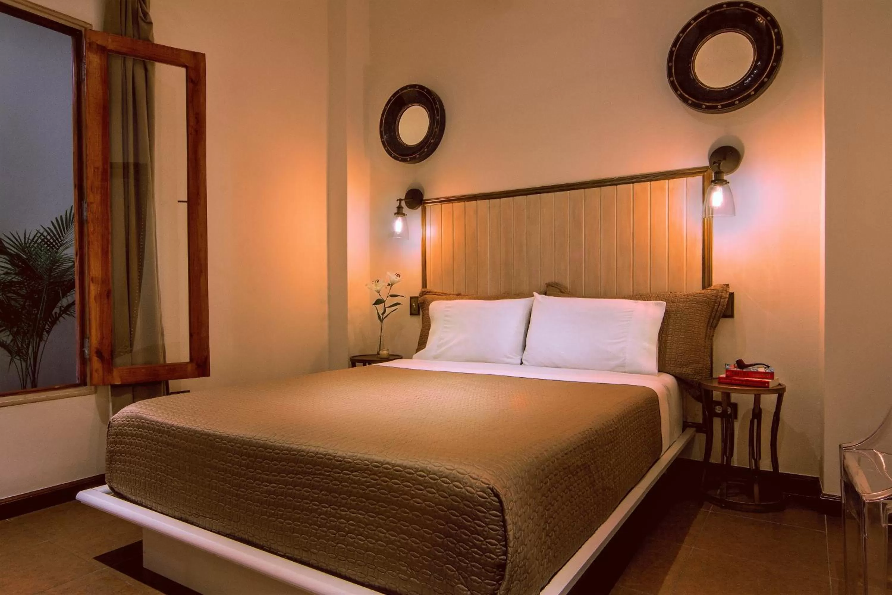 Bed in La Isabela Suites