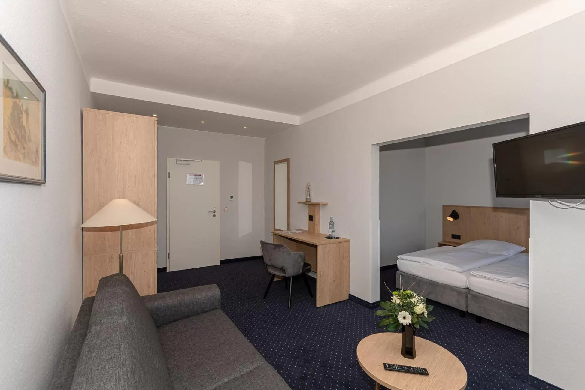 Photo of the whole room, Bed in Kurhotel Sassnitz