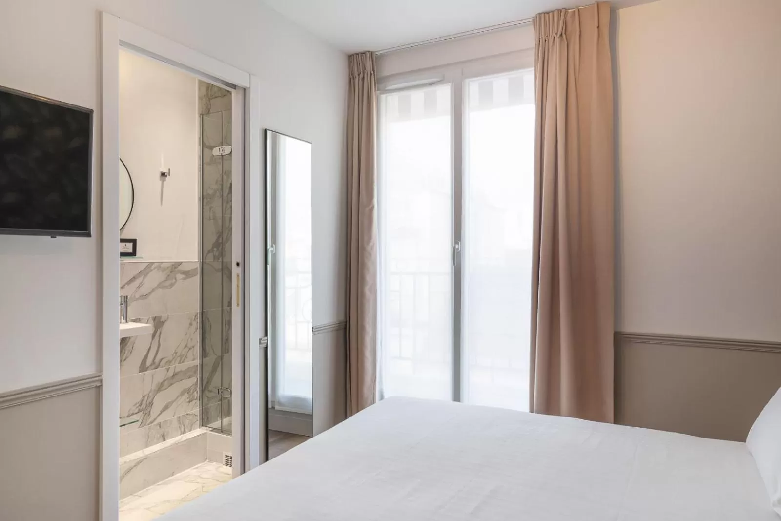 Bed in Hôtel 31 - Paris Tour Eiffel