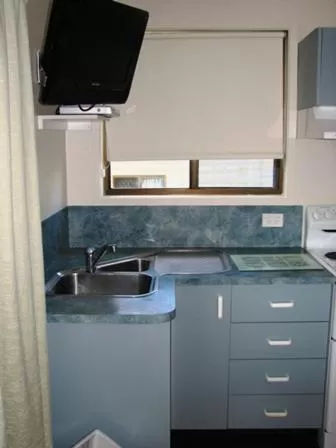 Kitchen or kitchenette in Woolgoolga Beach Holiday Park
