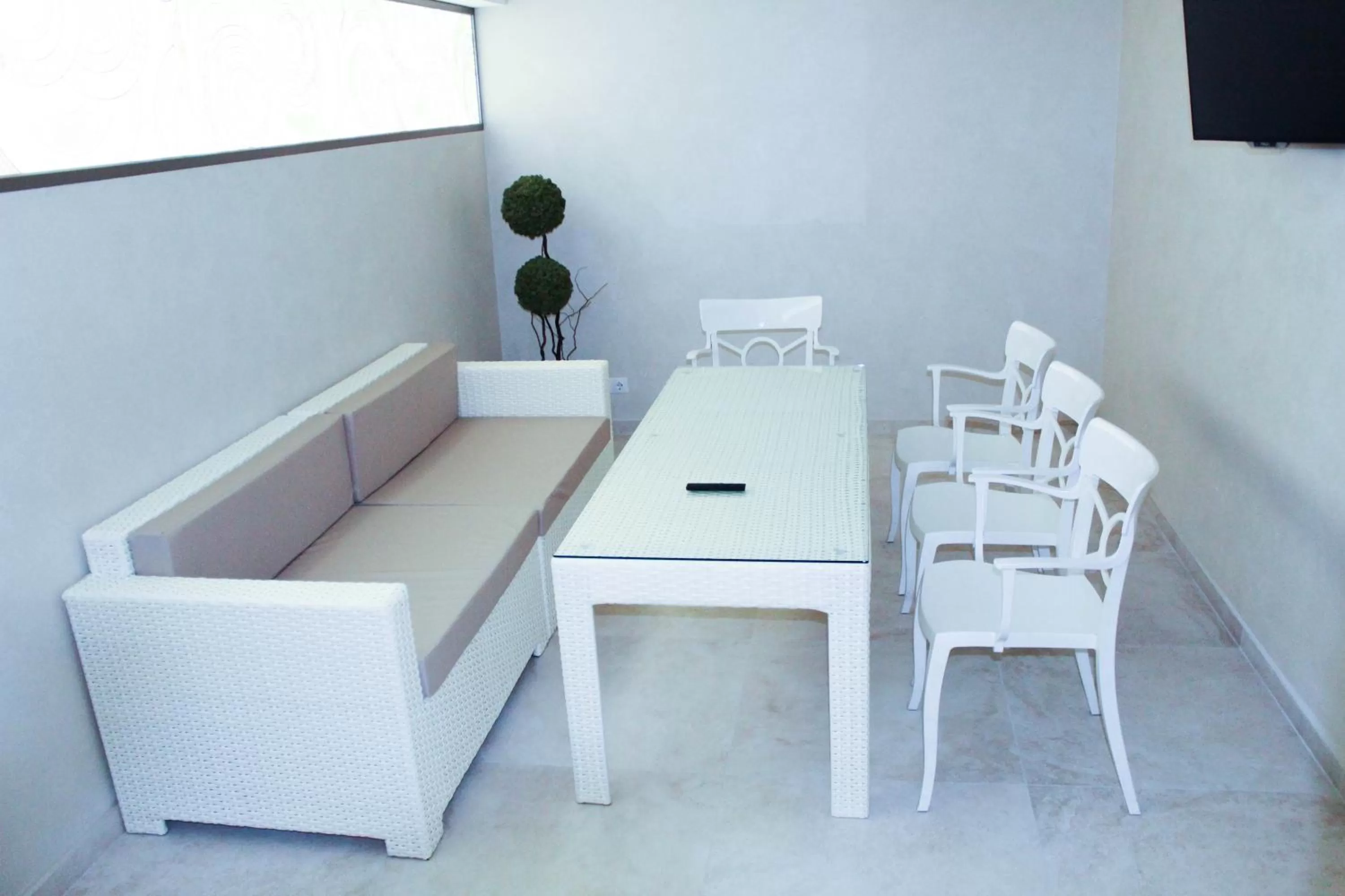 Seating area in Familion ApartHotel