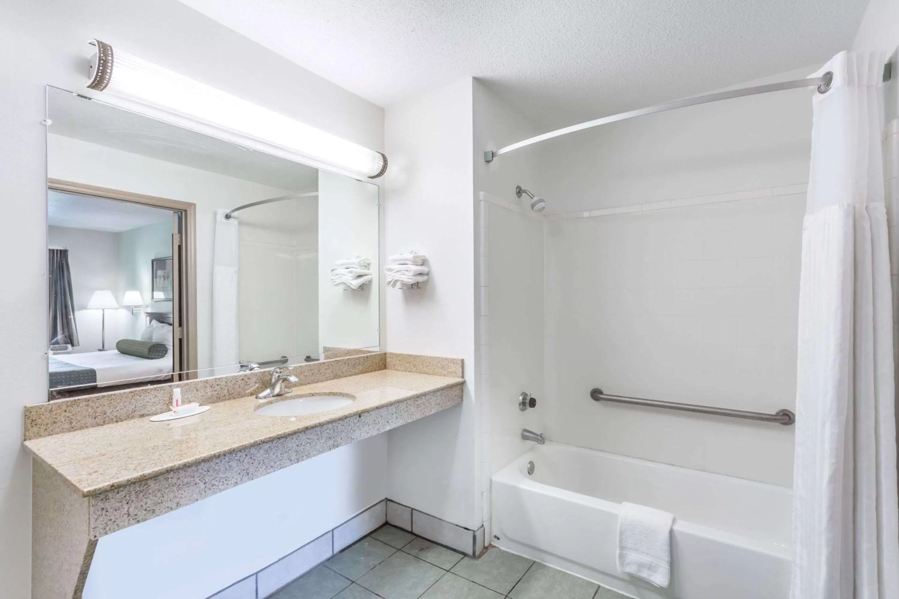 Bathroom in Days Inn by Wyndham Raleigh Glenwood-Crabtree