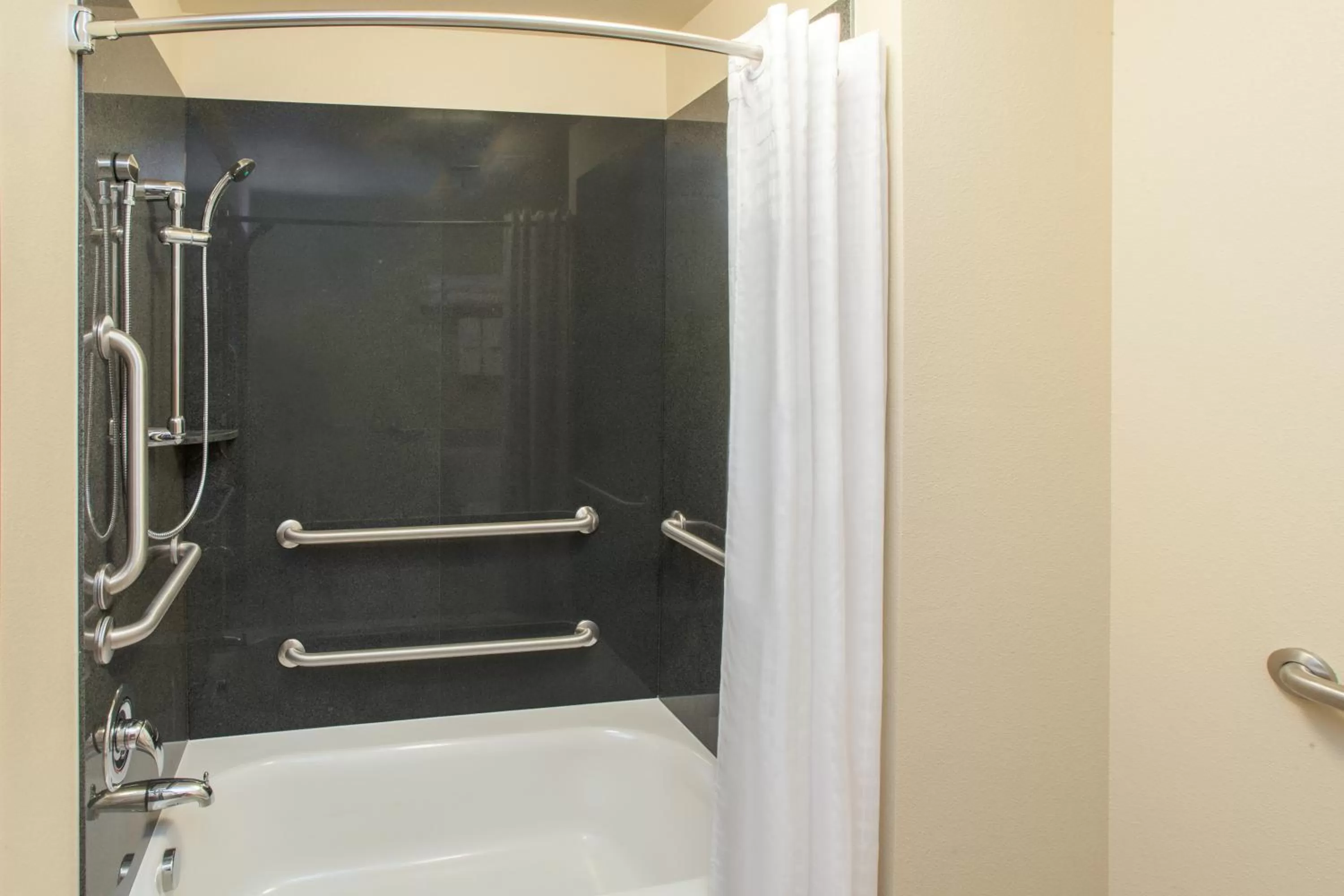 Shower in Baymont by Wyndham Grand Forks