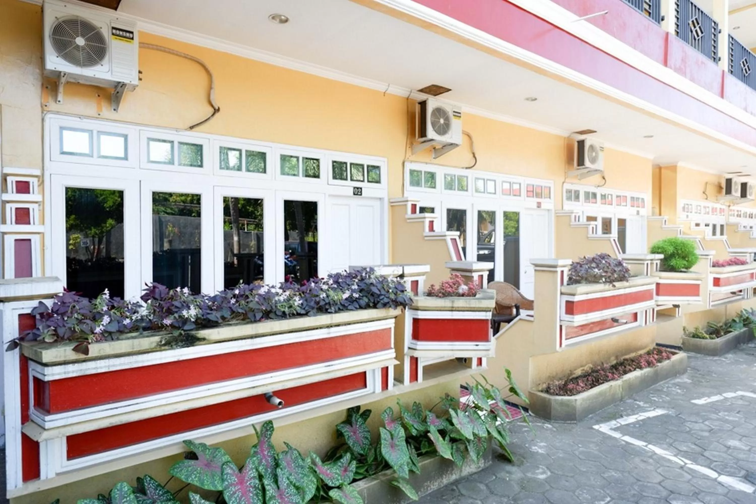 Facade/entrance in RedDoorz Plus near Stadion Wijaya Kusuma