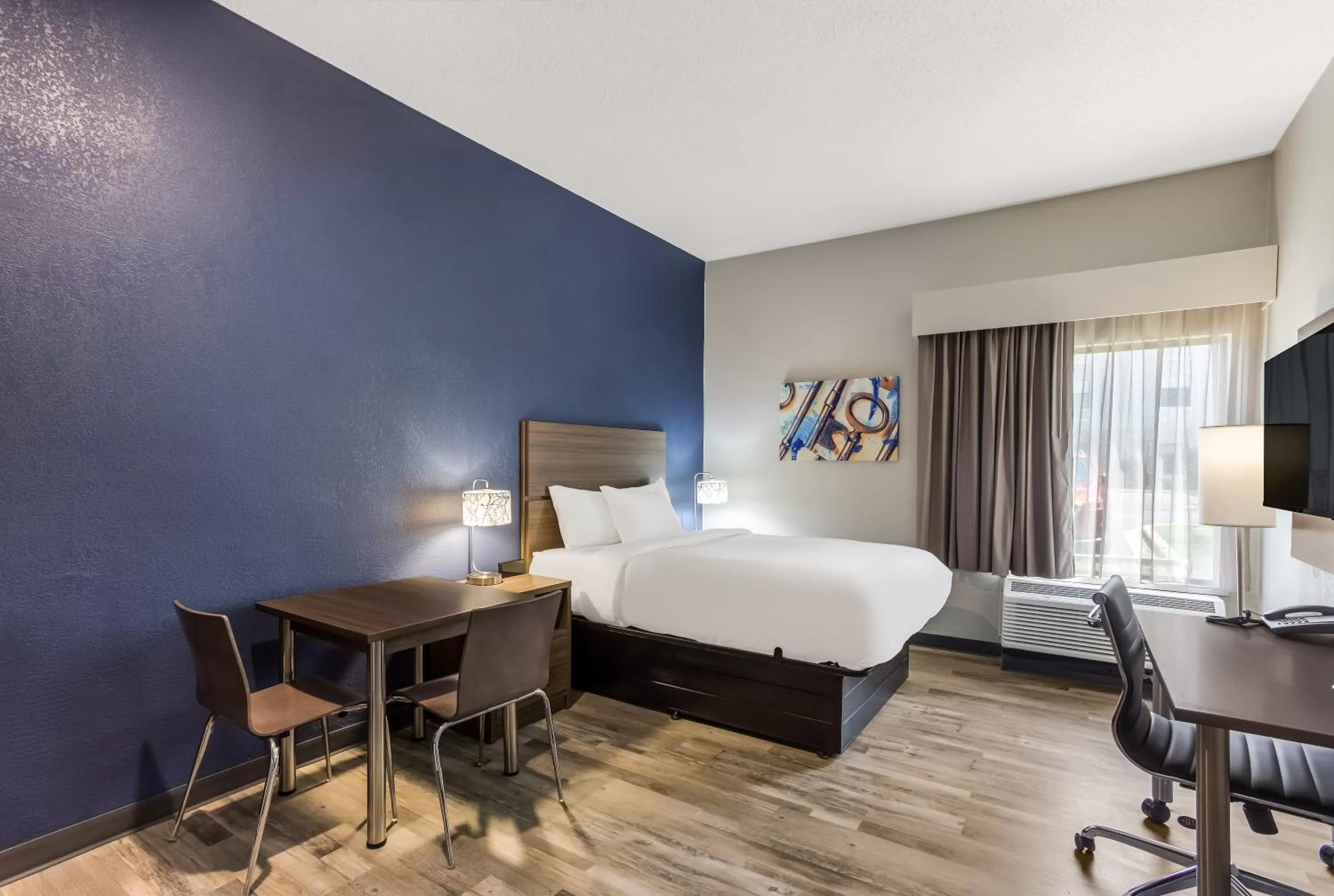 Bed in MainStay Suites Bourbonnais - Kankakee