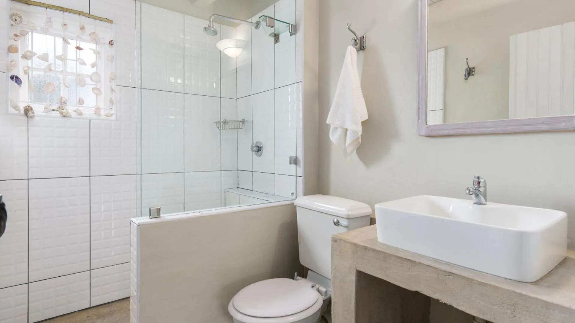 Toilet in Blue Bay Lodge