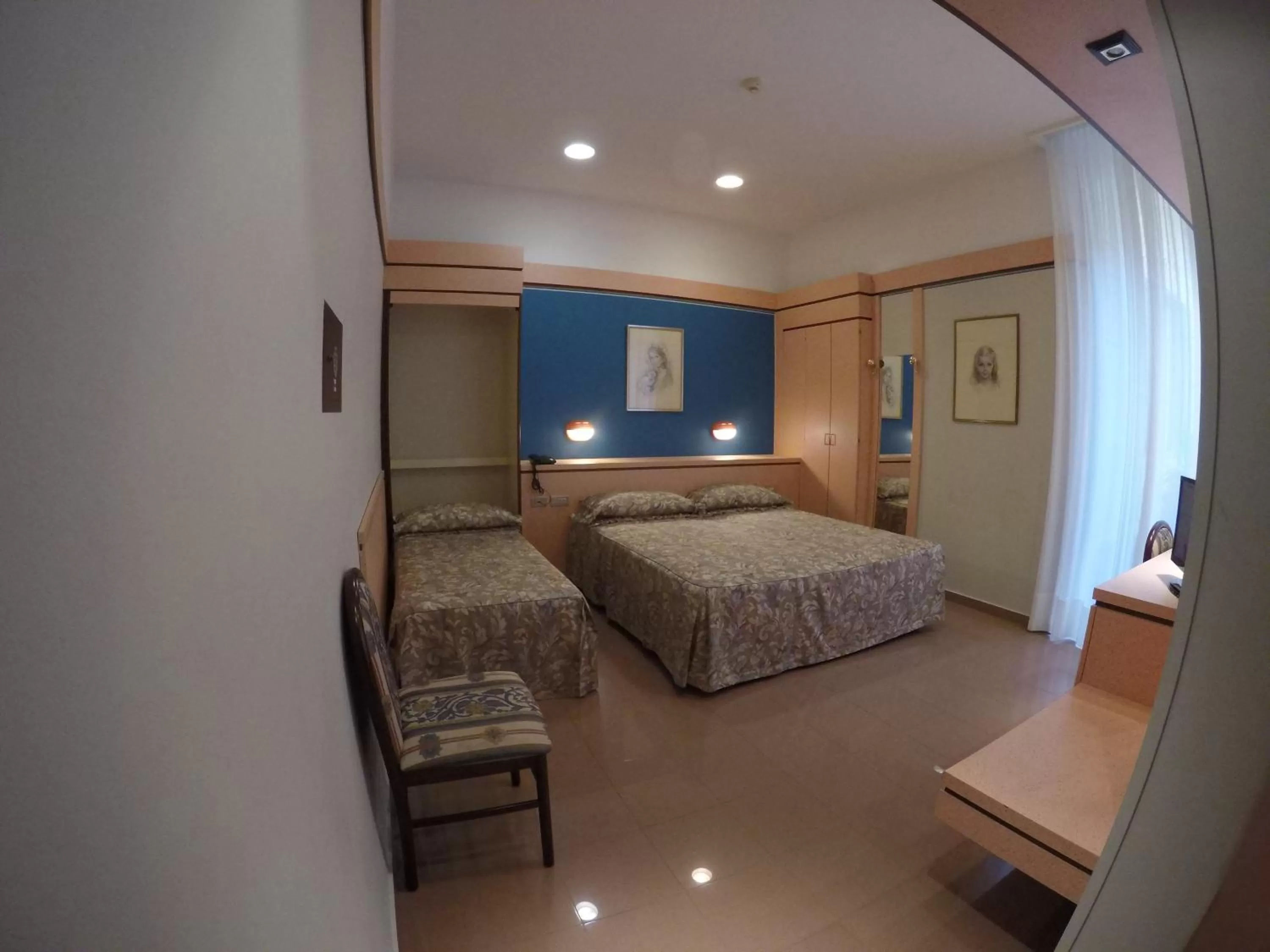 Standard Triple Room in Le Petit Hotel