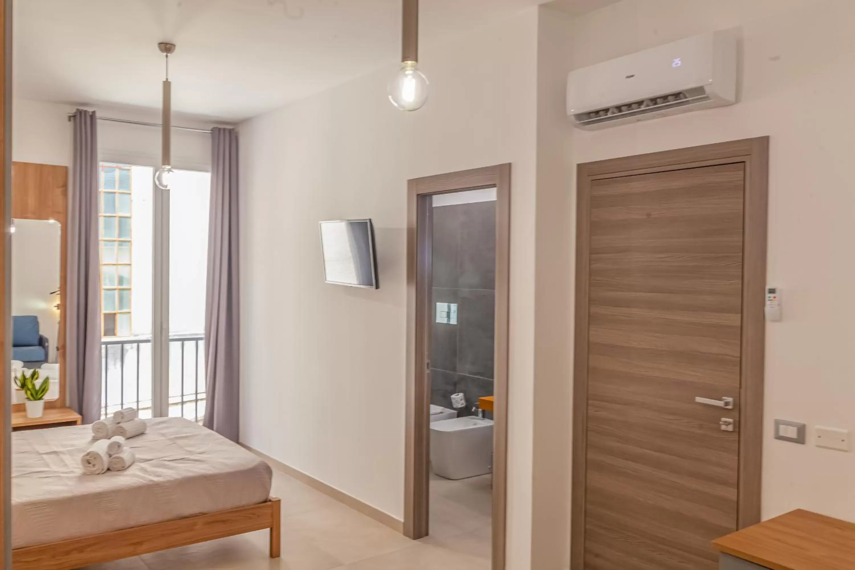 Quadruple Room with Private Bathroom in Isgrò Rooms Quadruple Room with Private Bathroom in Isgrò Rooms