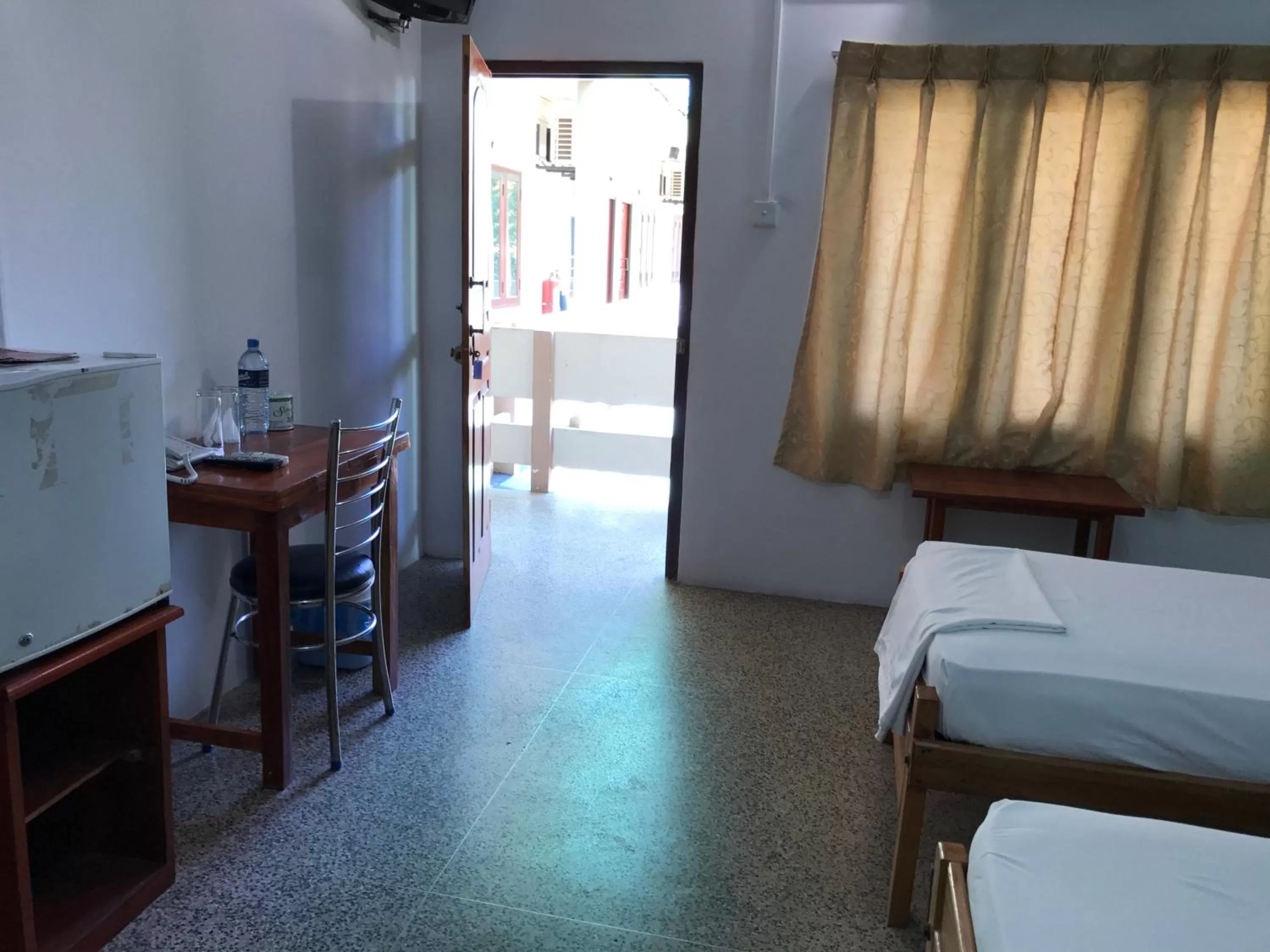 Bed in Gnaanams Hotel and Restaurant