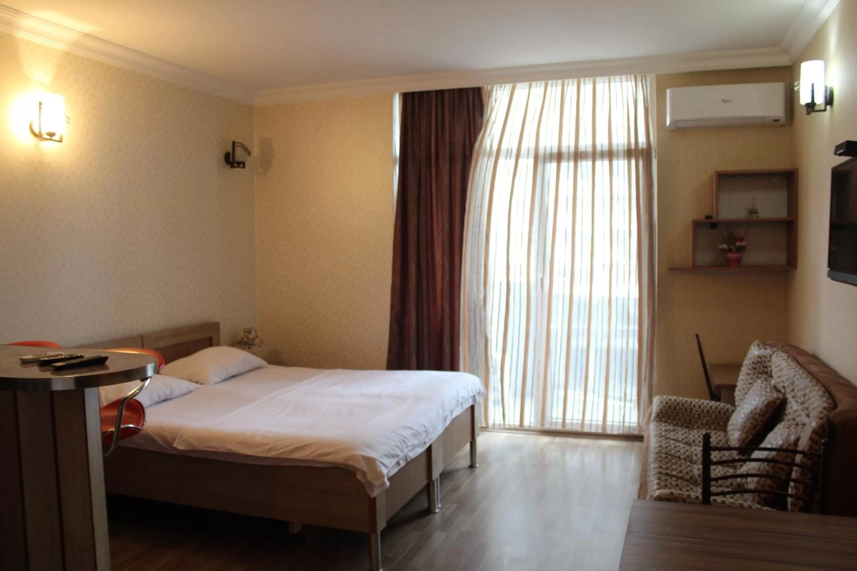 Bed in Orbi Lux Apartment