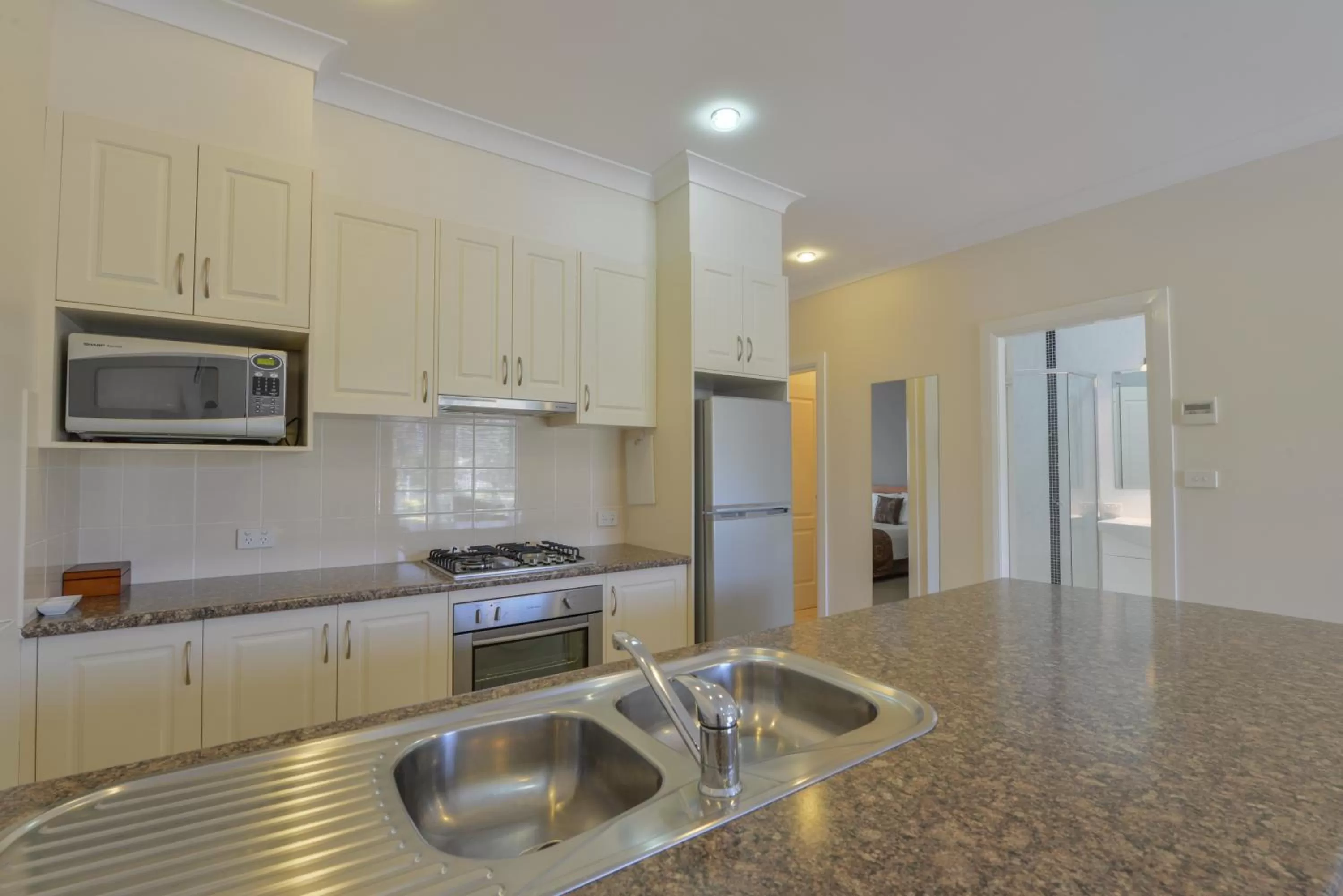 Kitchen or kitchenette in Cadman Motor Inn and Apartments