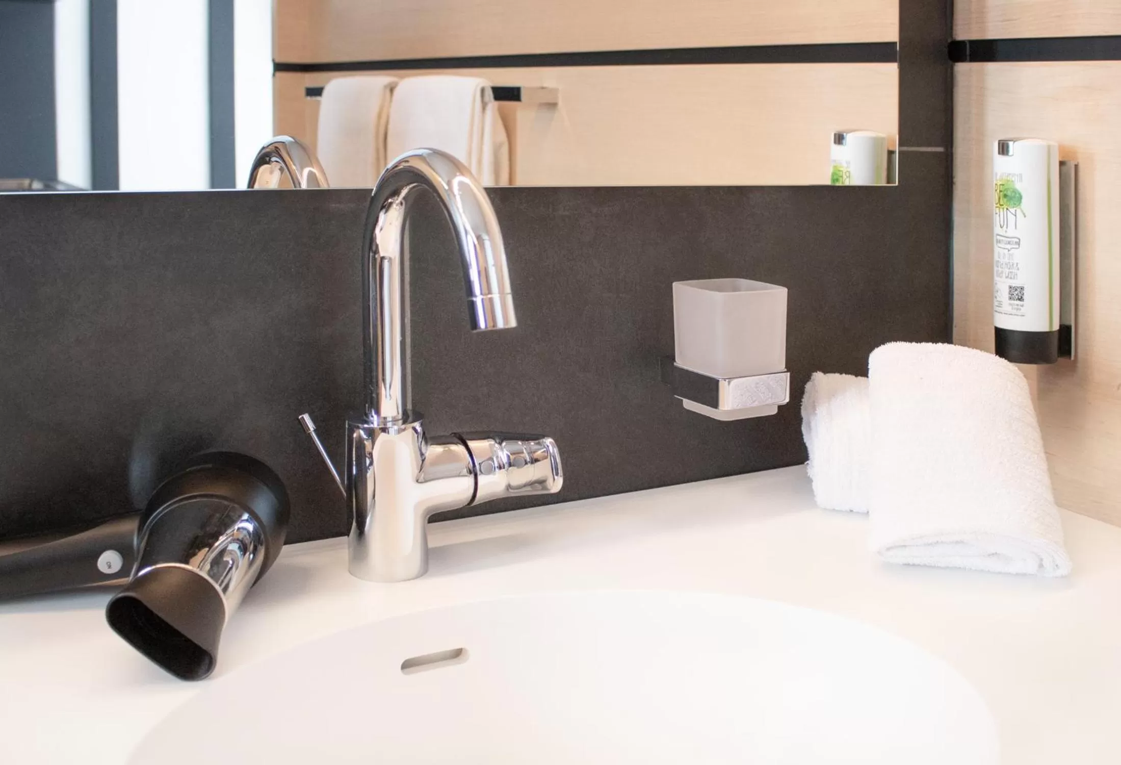 Bathroom in RNK Hotel by WMM Hotels