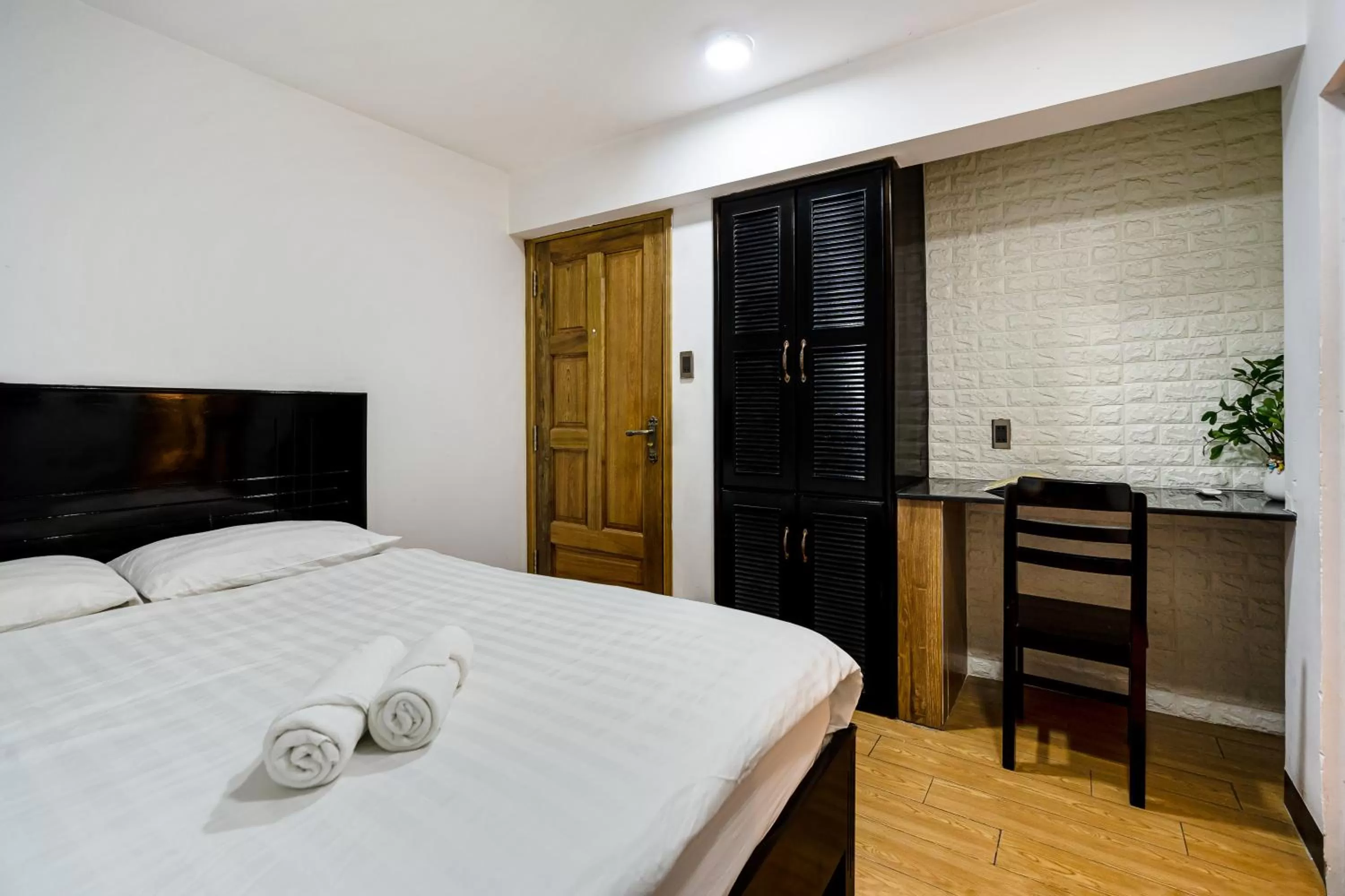 Bed in Lotus Laverne Hotel