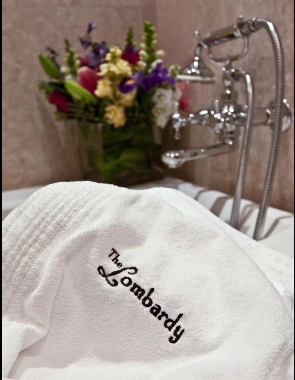 Text overlay, Bed in Lombardy Hotel