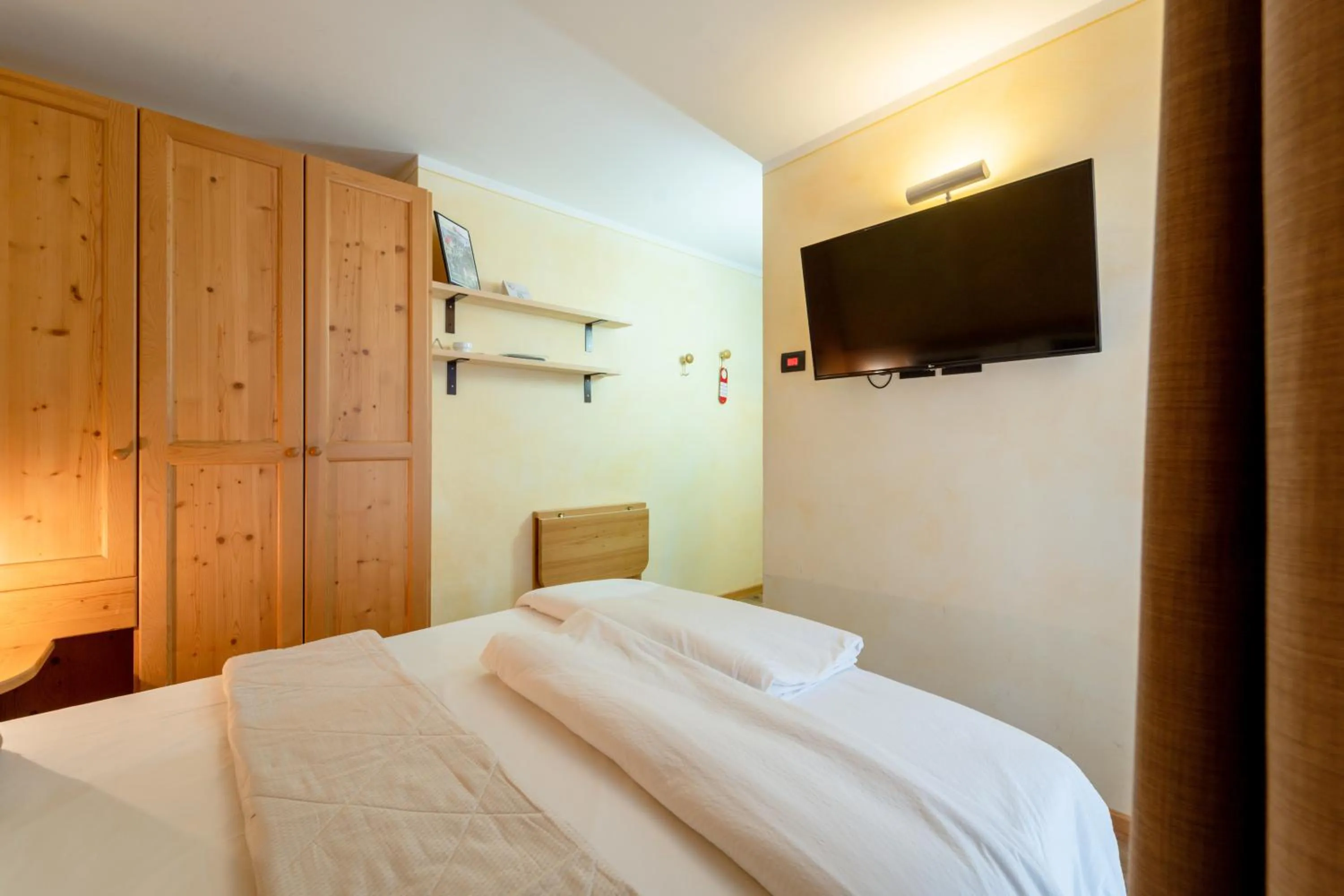 Bed in Negritella Sweet Hotel