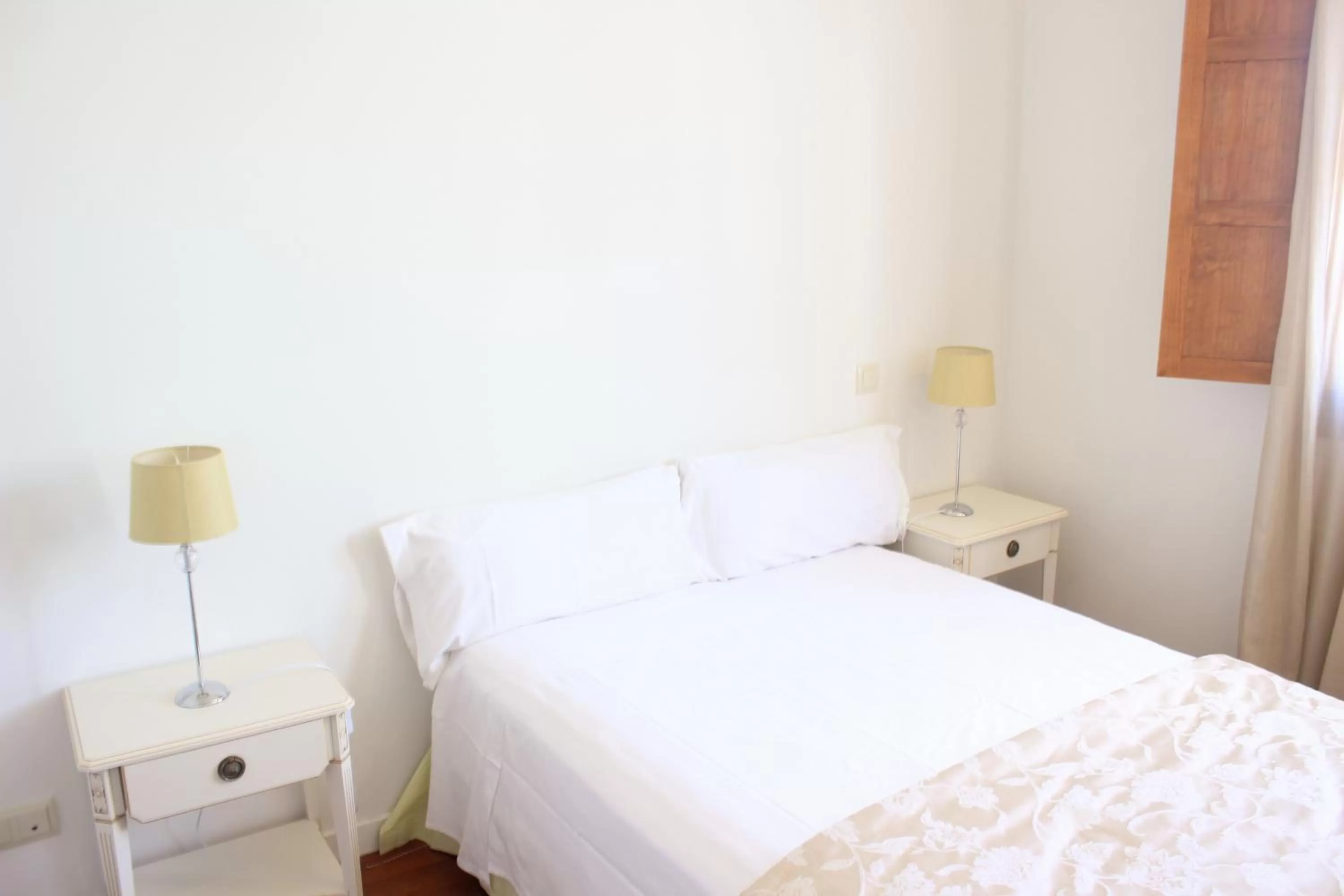 Bed in Casa Urbana Suites