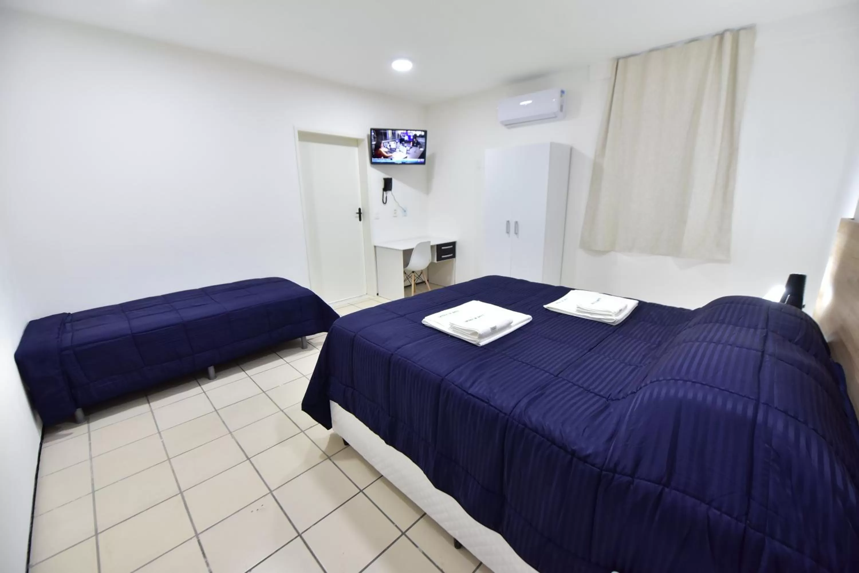 Bed in LIVE IN FORTALEZA HOTEL