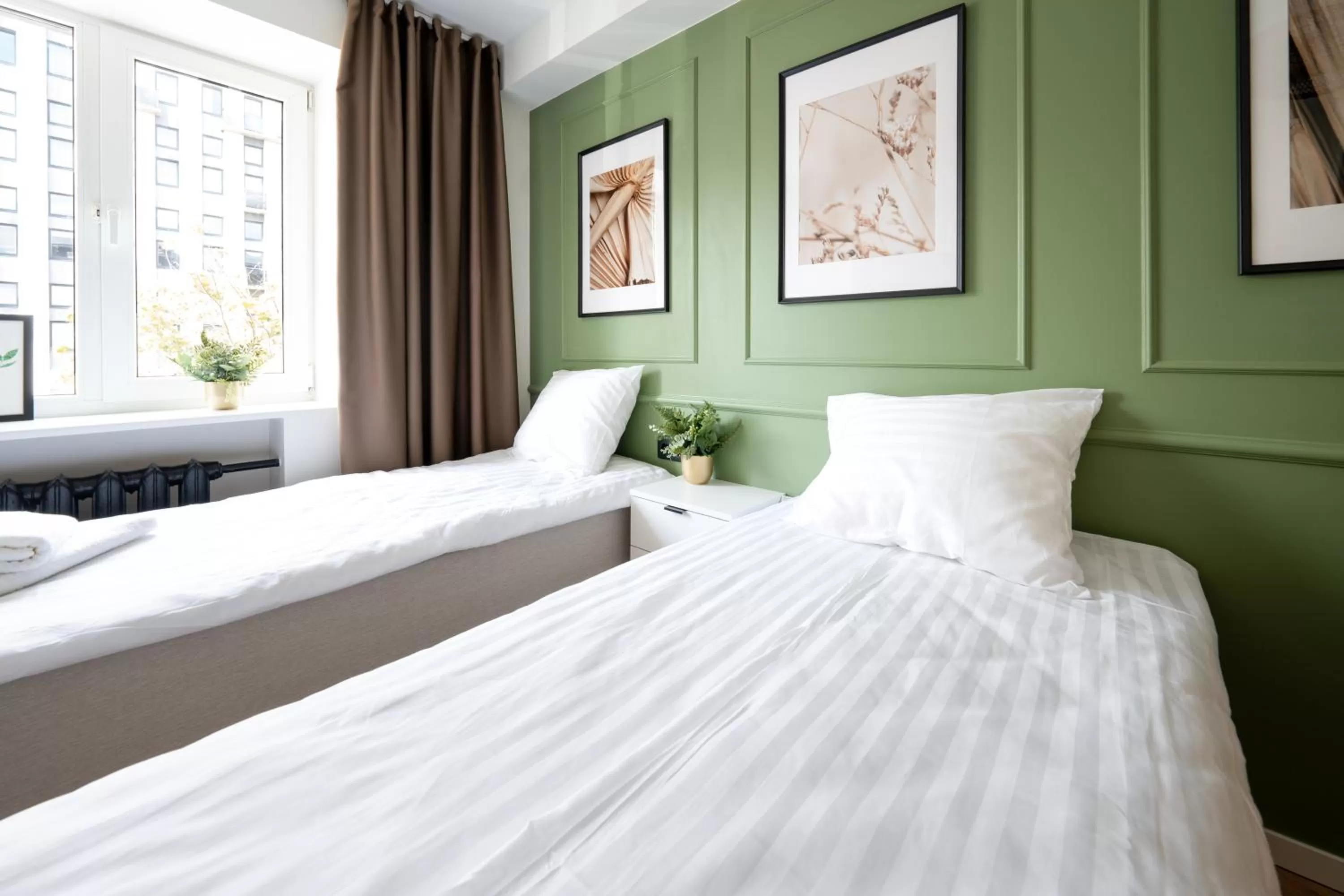 Bed in Oasis Airport Studios by RevalHome