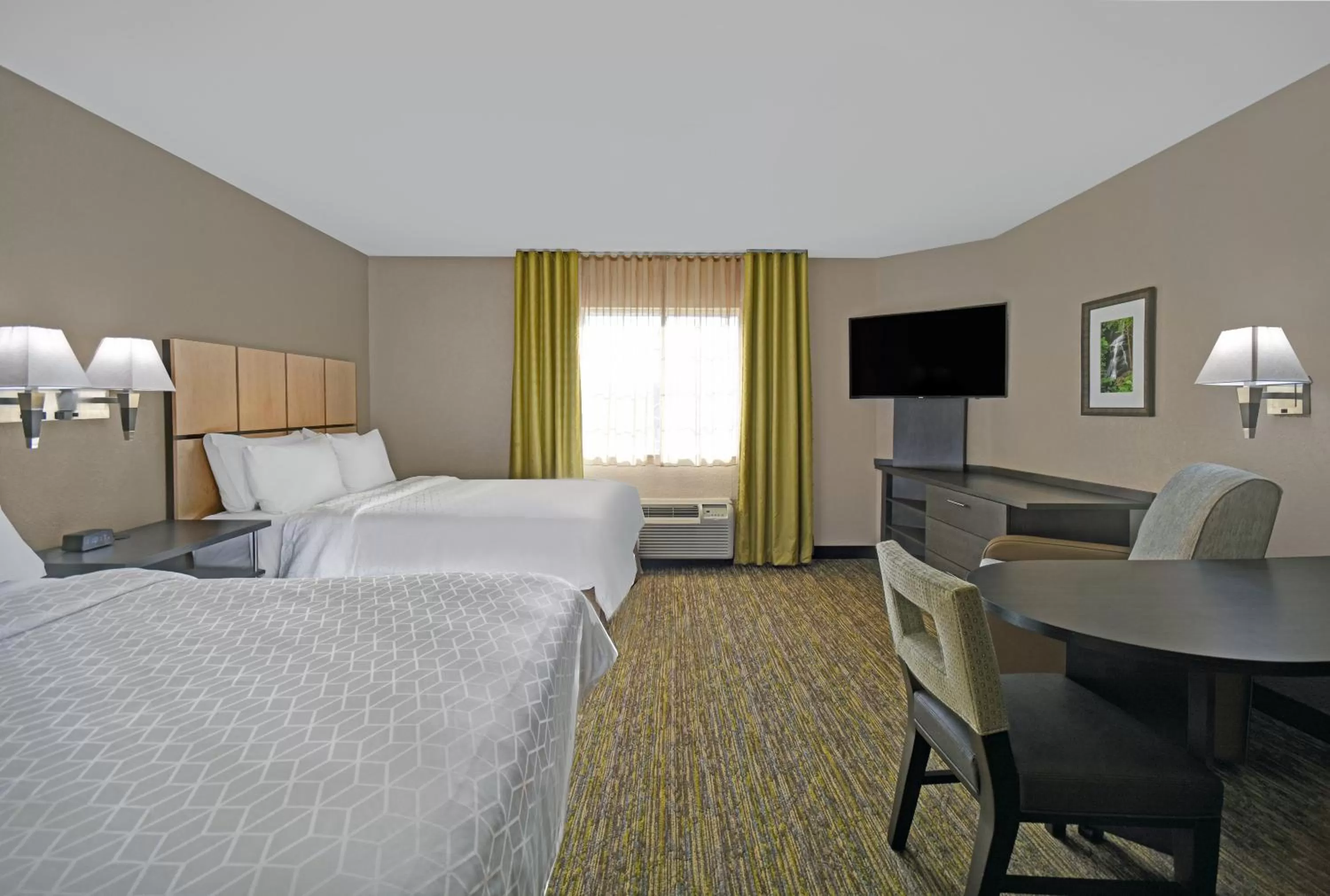 Photo of the whole room, Bed in Candlewood Suites Sumter by IHG
