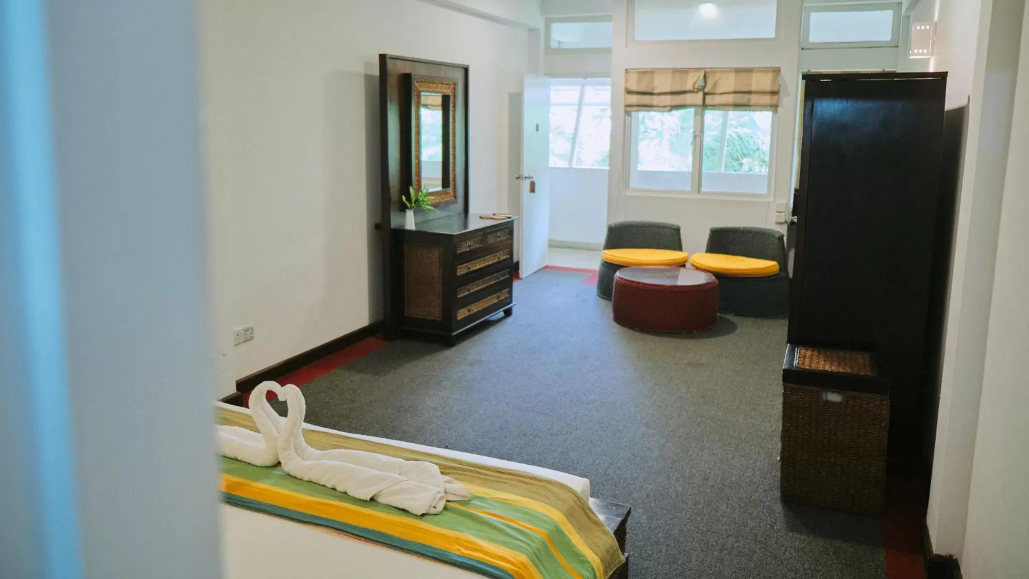 Bed in St.Lachlan Hotel & Suites