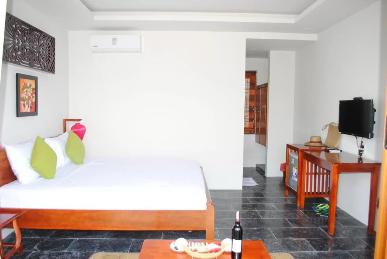 Bed in Hoi an Osaka Riverside Villa & Spa