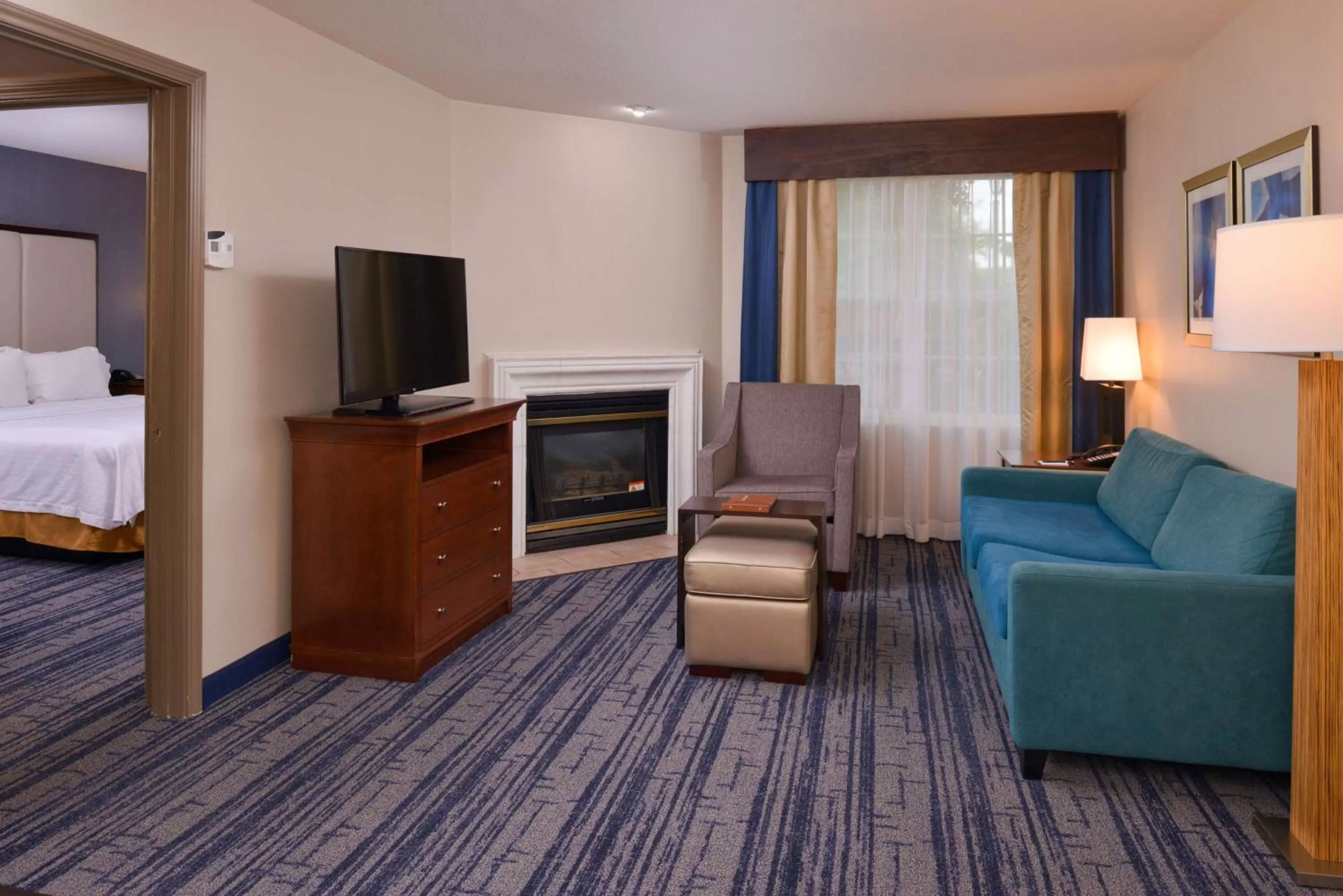 Living room, Bed in Homewood Suites by Hilton Dallas-Lewisville