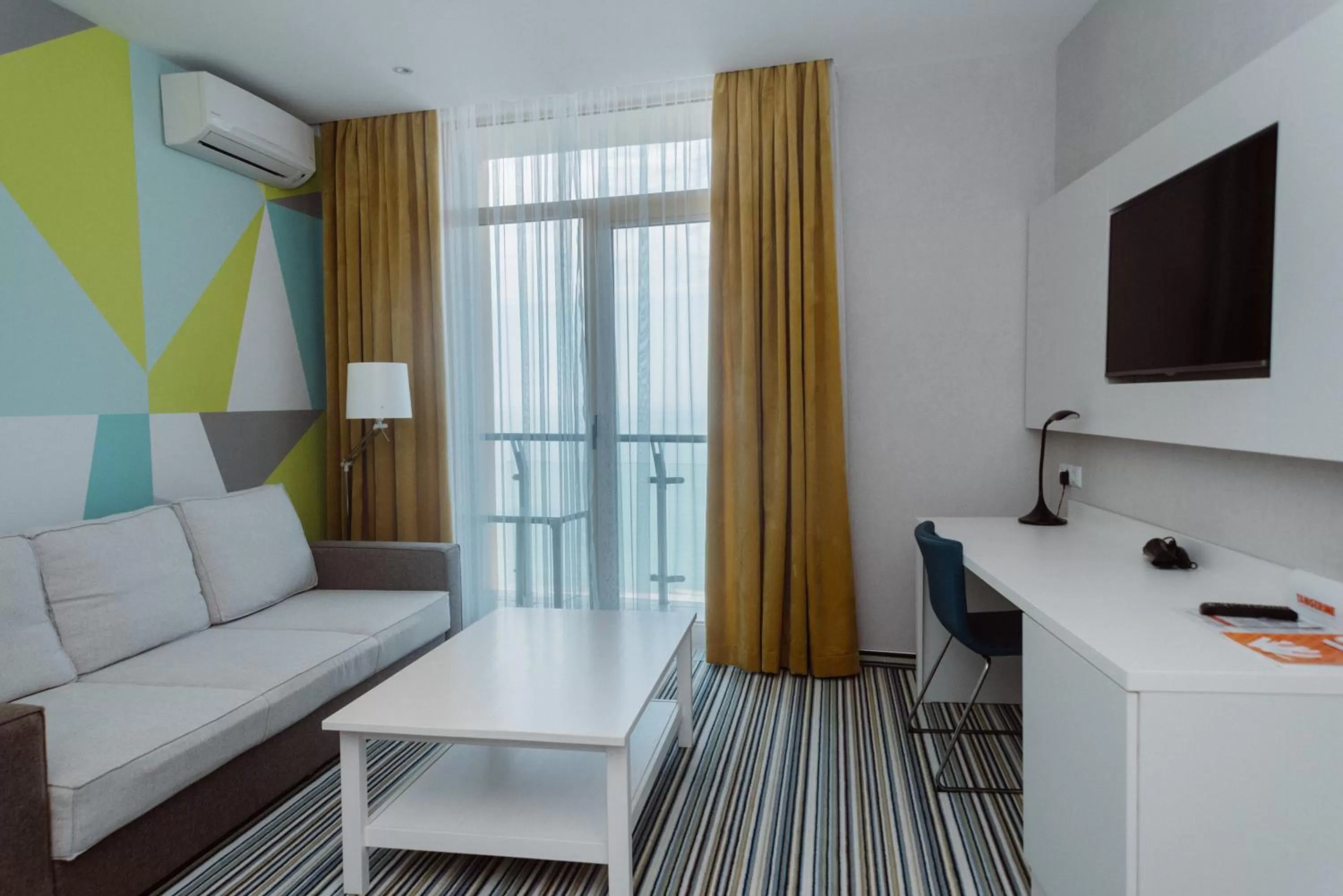 Photo of the whole room in Aparthotel Tangerine