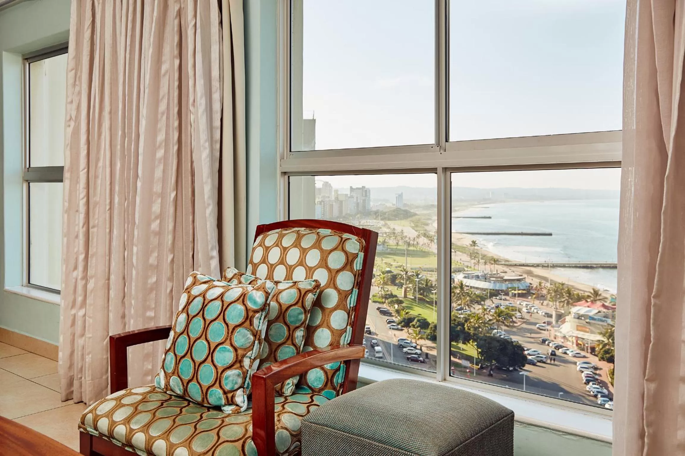 Seating area in First Group The Palace All-Suite