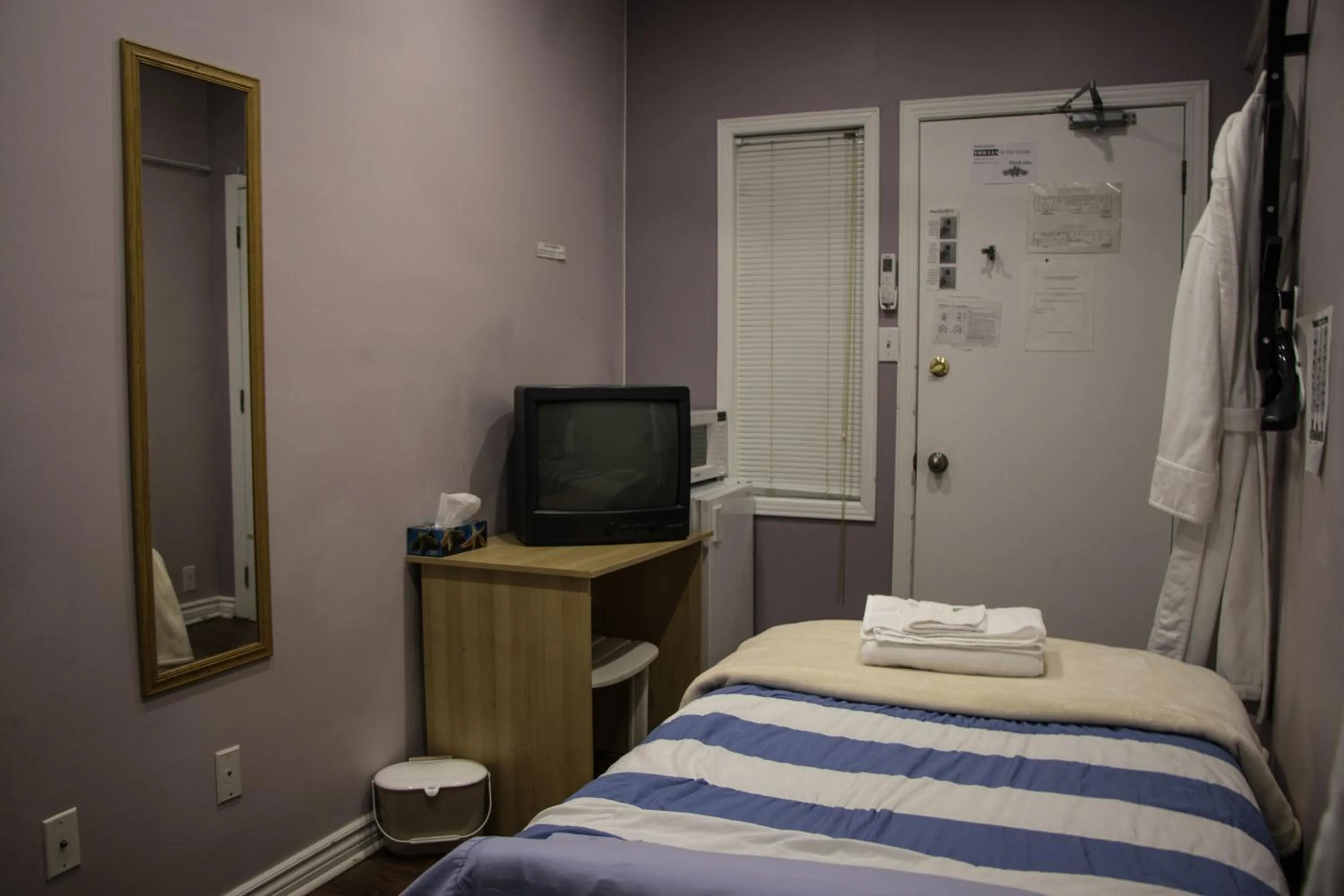 Bed in Saint Lawrence Residences and Suites