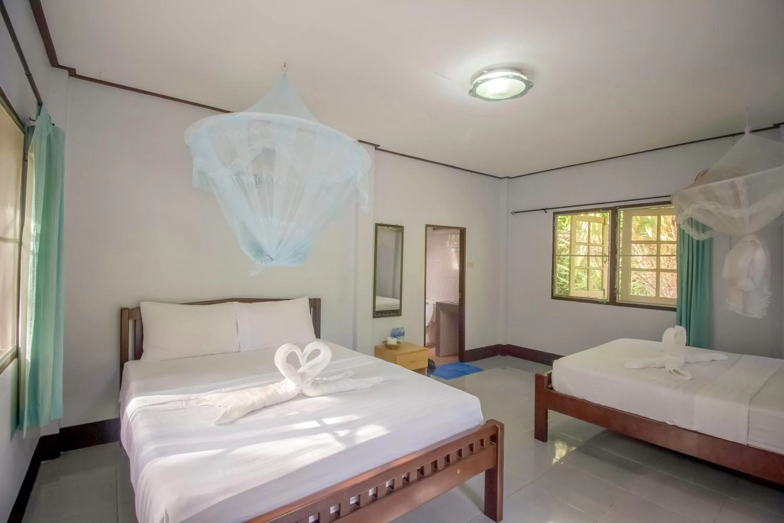 Bed in Khao Sok Palmview Resort