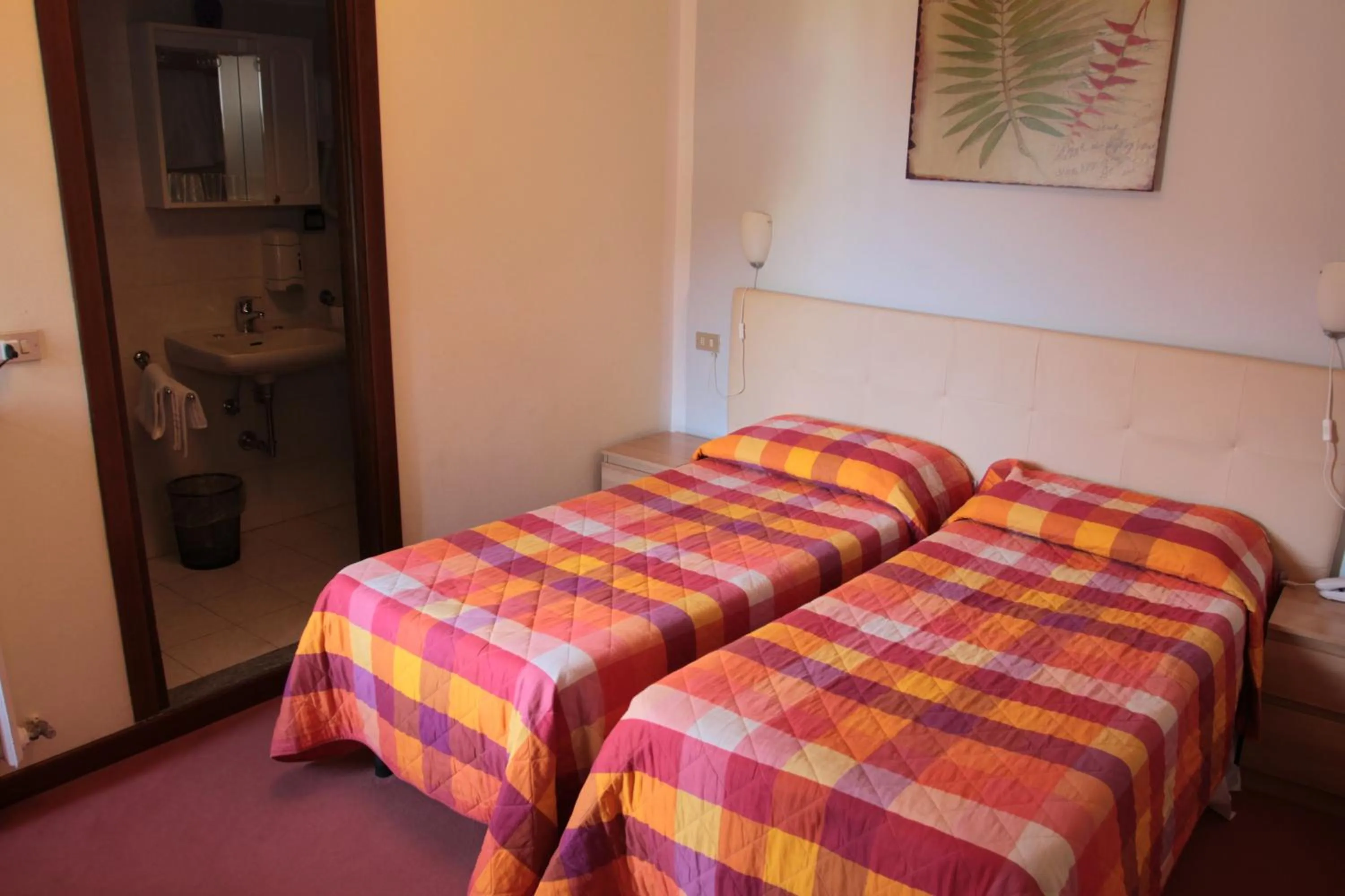 Bed in Hotel Domodossola