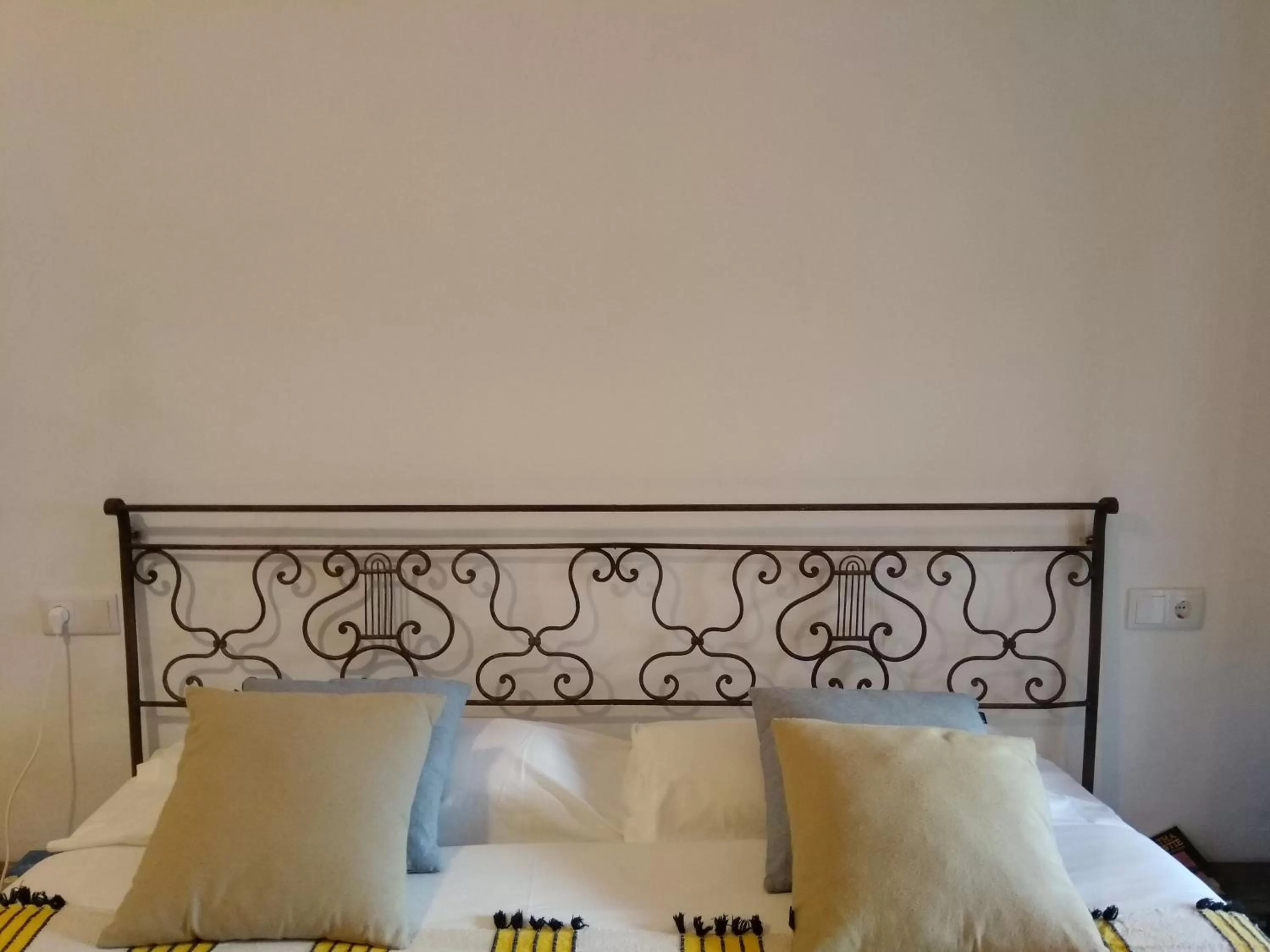 Decorative detail, Bed in La Maga Rooms