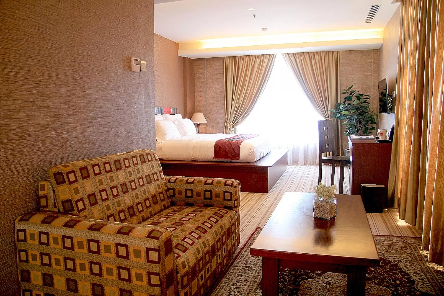 Photo of the whole room, Bed in Lion Hotel & Plaza Manado