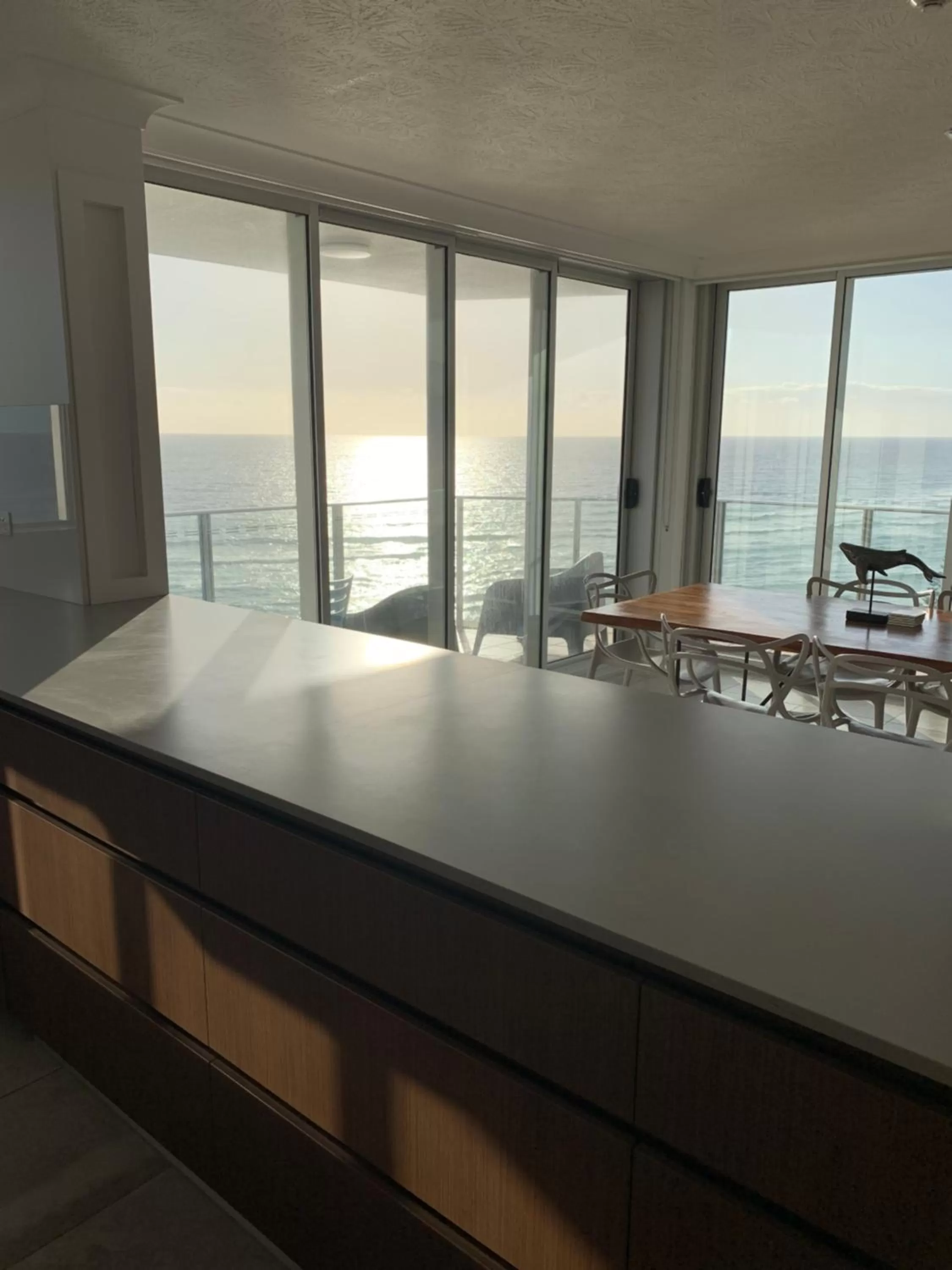 Dining area in Pacific Regis Beachfront Holiday Apartments