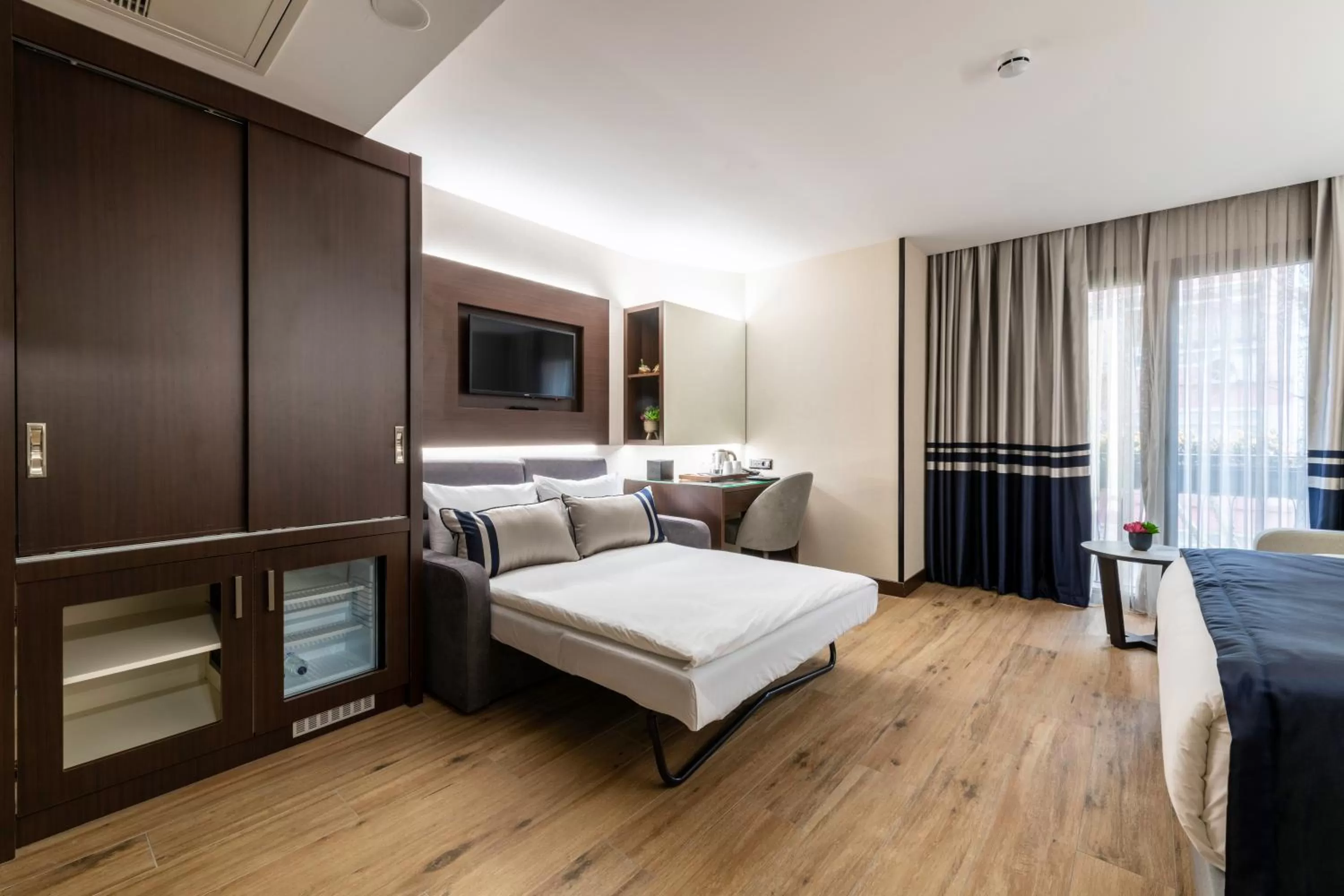 Bed in Aprilis Deluxe Hotel