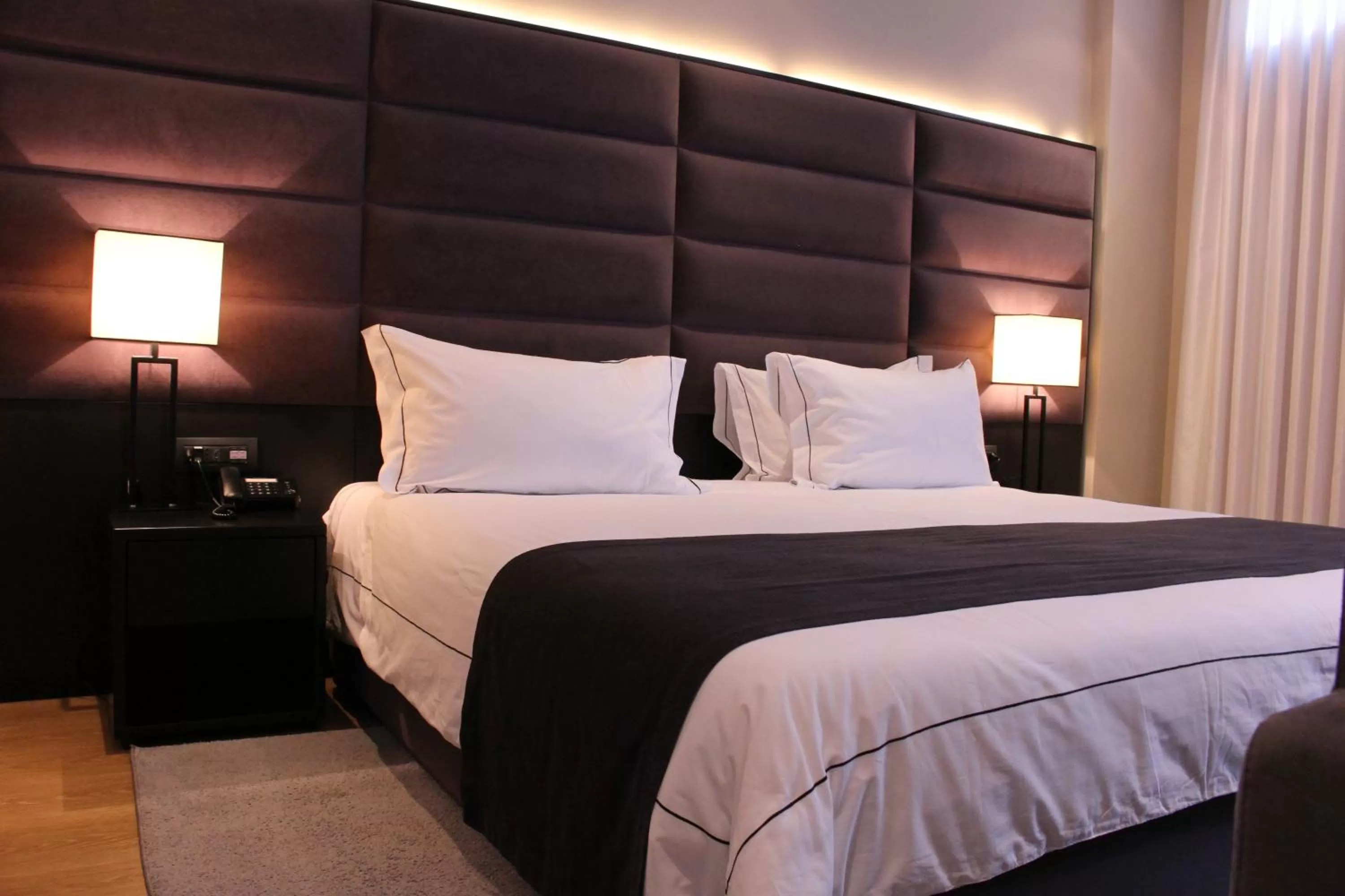 Bed in Privilege Hotel & Spa