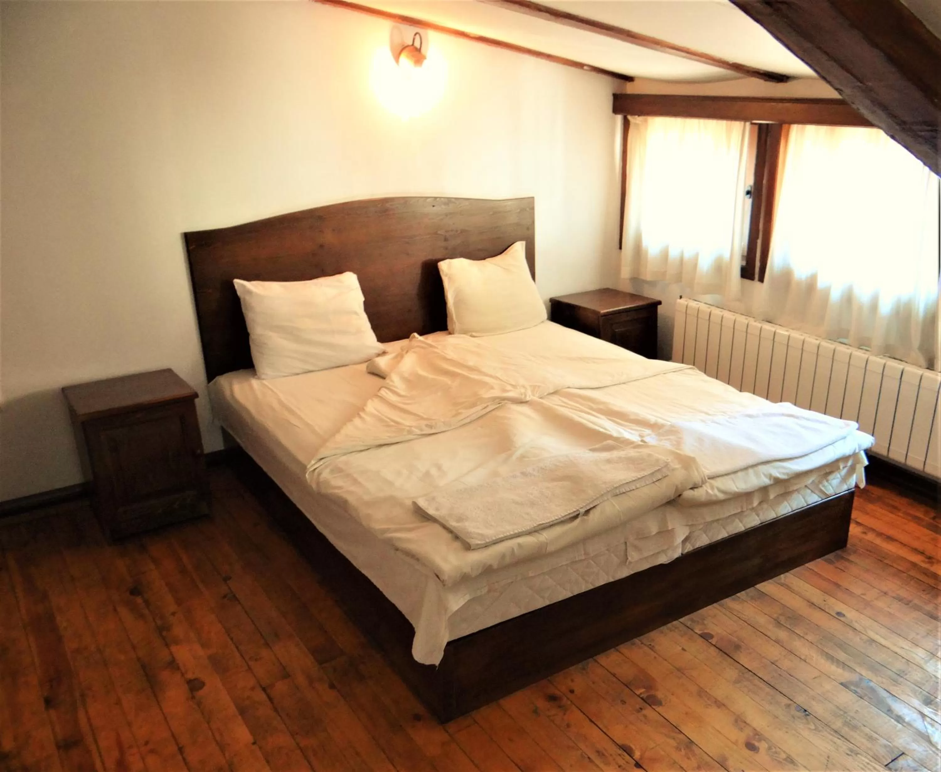 Bed in The Old House Family Hotel