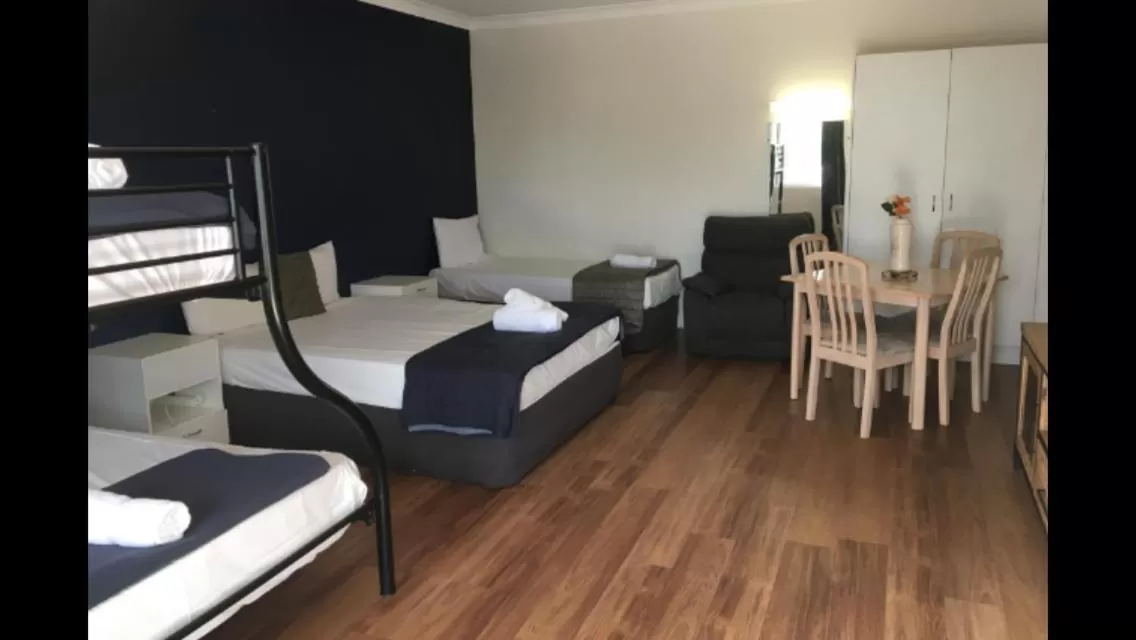 Bed in Blue Pelican Motel