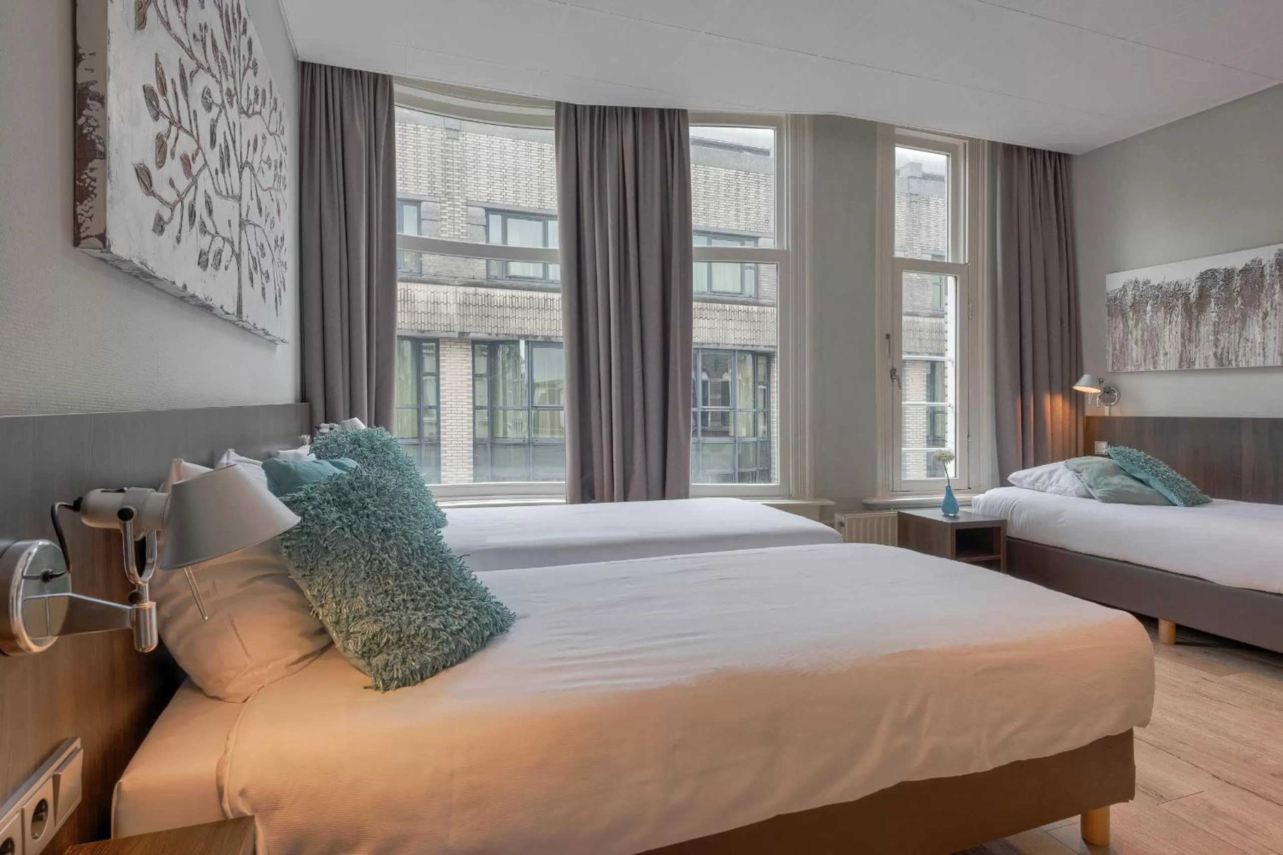 Bed in Hotel Damsquare