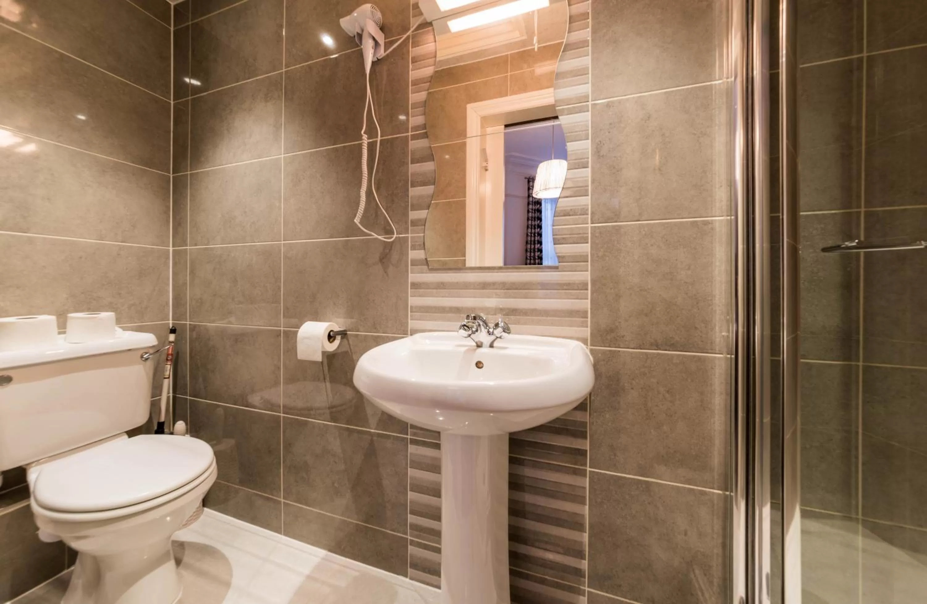 Bathroom in Hellenic Hotel by Saba