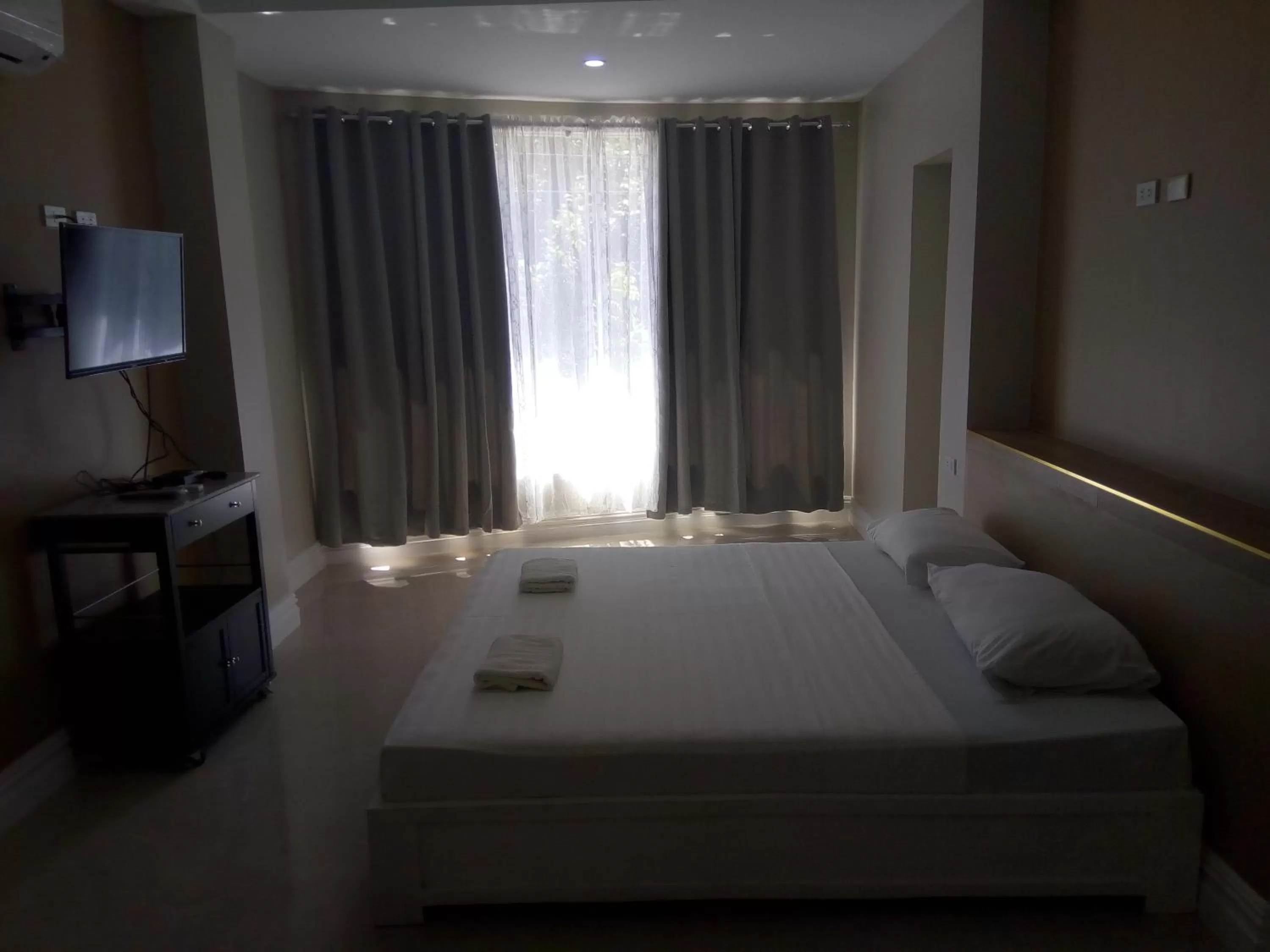 Bed in Sandscape Hotel