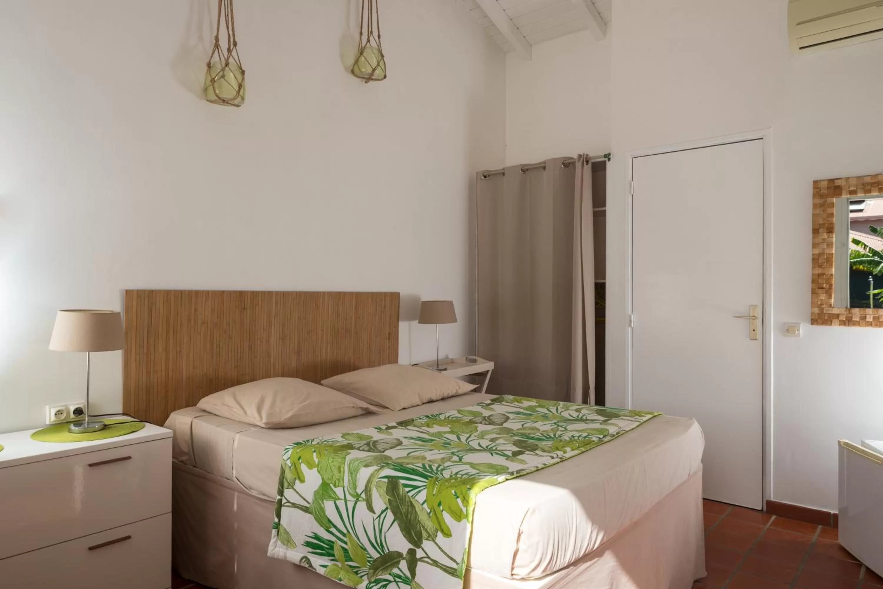 Photo of the whole room, Bed in Hôtel Les Bananiers