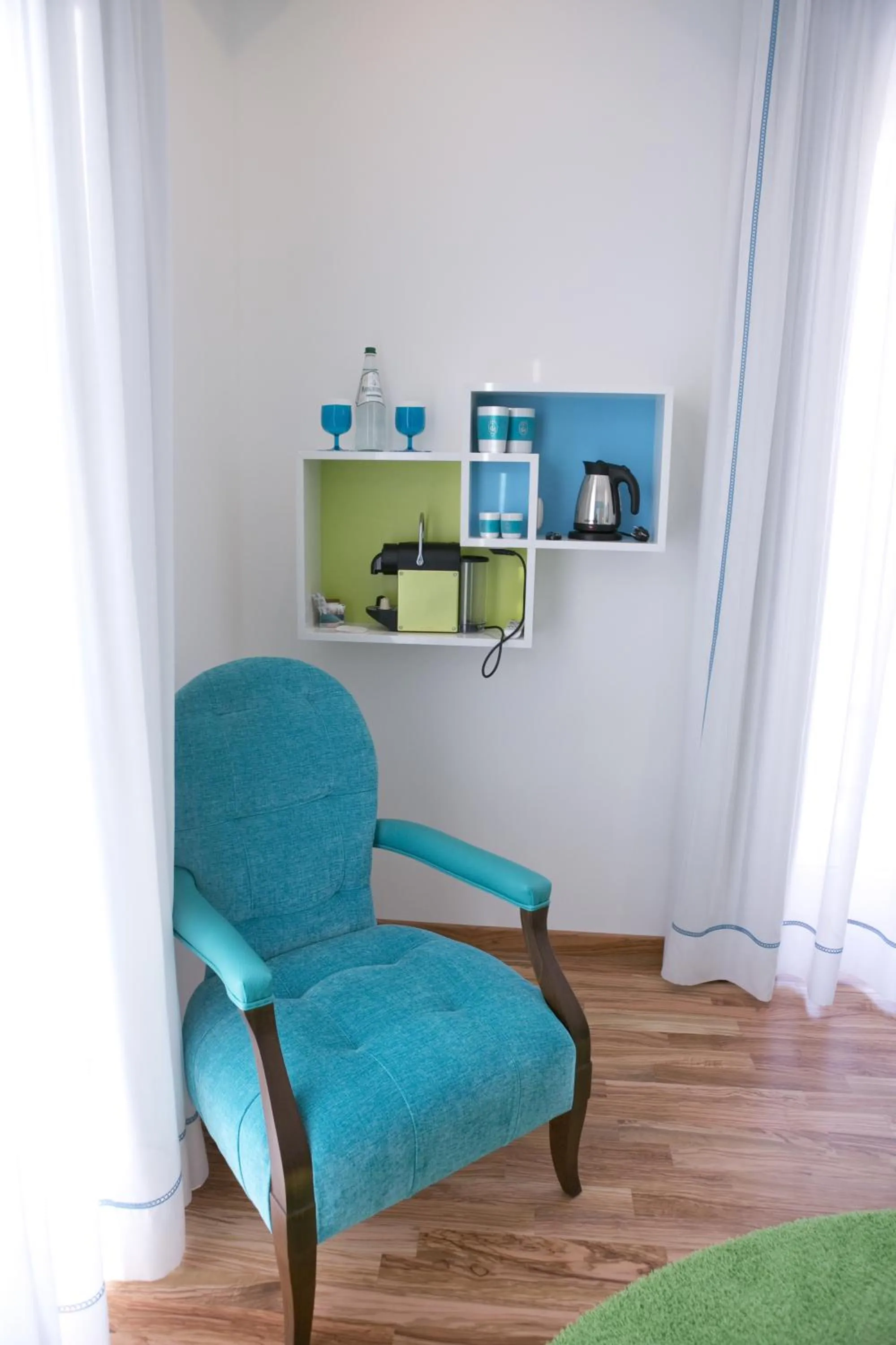 Seating area in Piccolo Grand Hotel