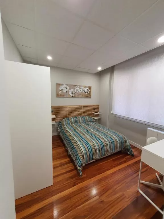 Bed in Guggenheim Riverview 5 Bedrooms