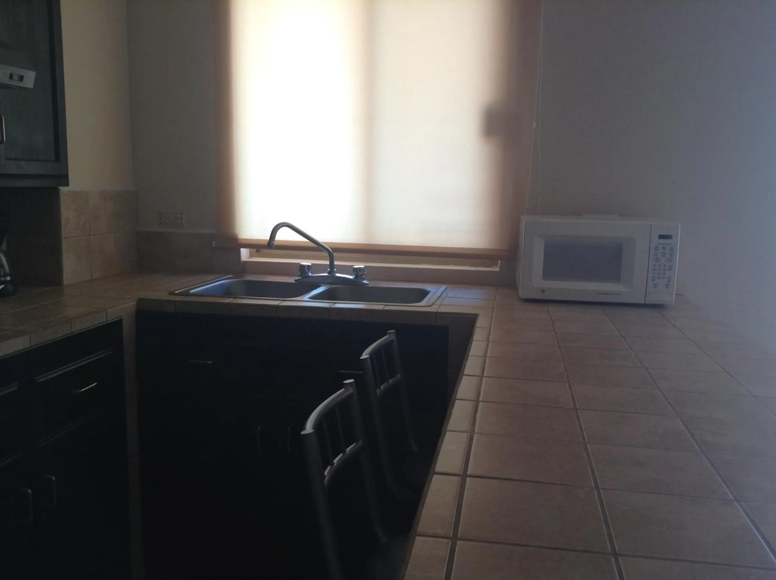 Kitchen or kitchenette in Los Jitos Hotel & Suites