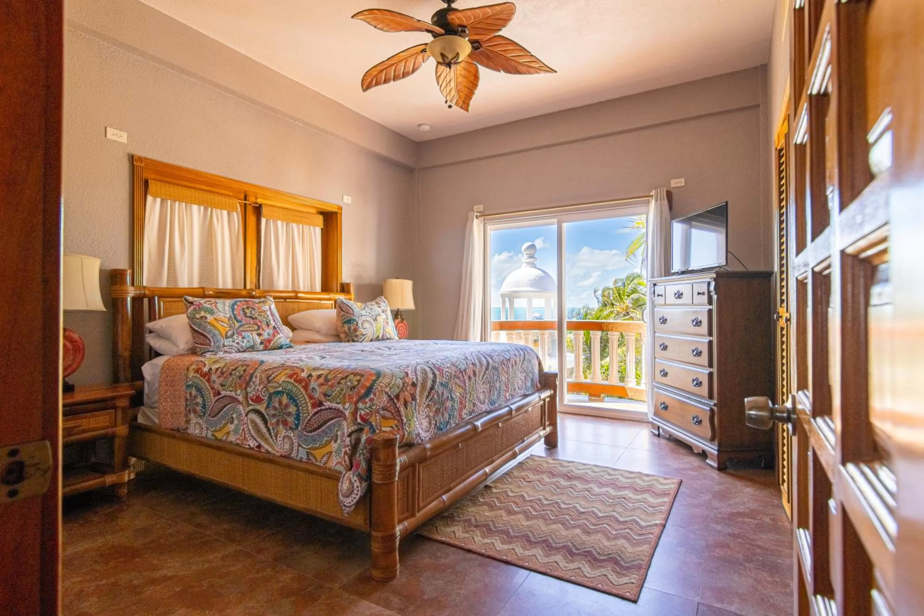 Bed in Lighthouse Beach Villas