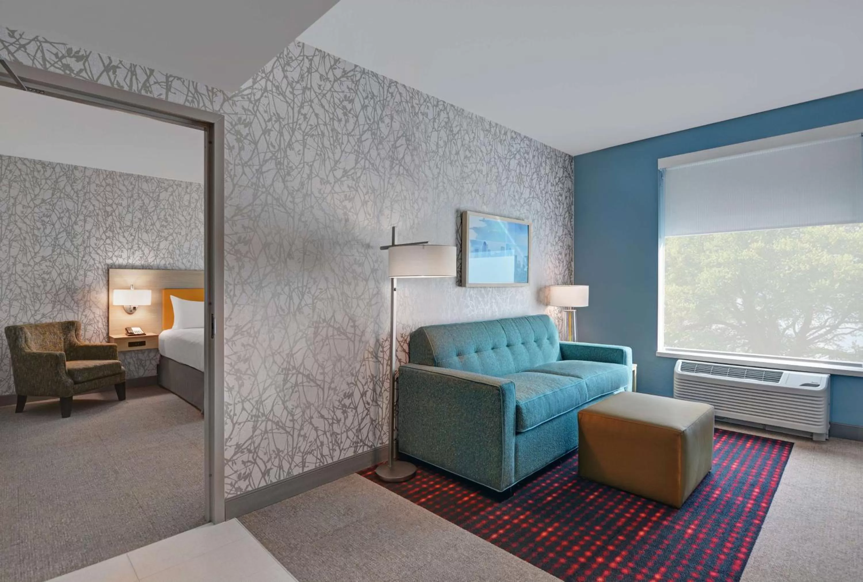 Living room, Bed in Home2 Suites By Hilton Largo, Fl