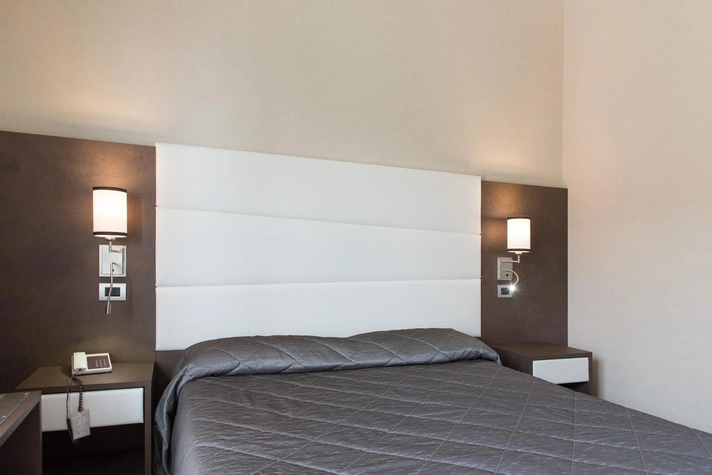 Bed in Reginna Palace Hotel