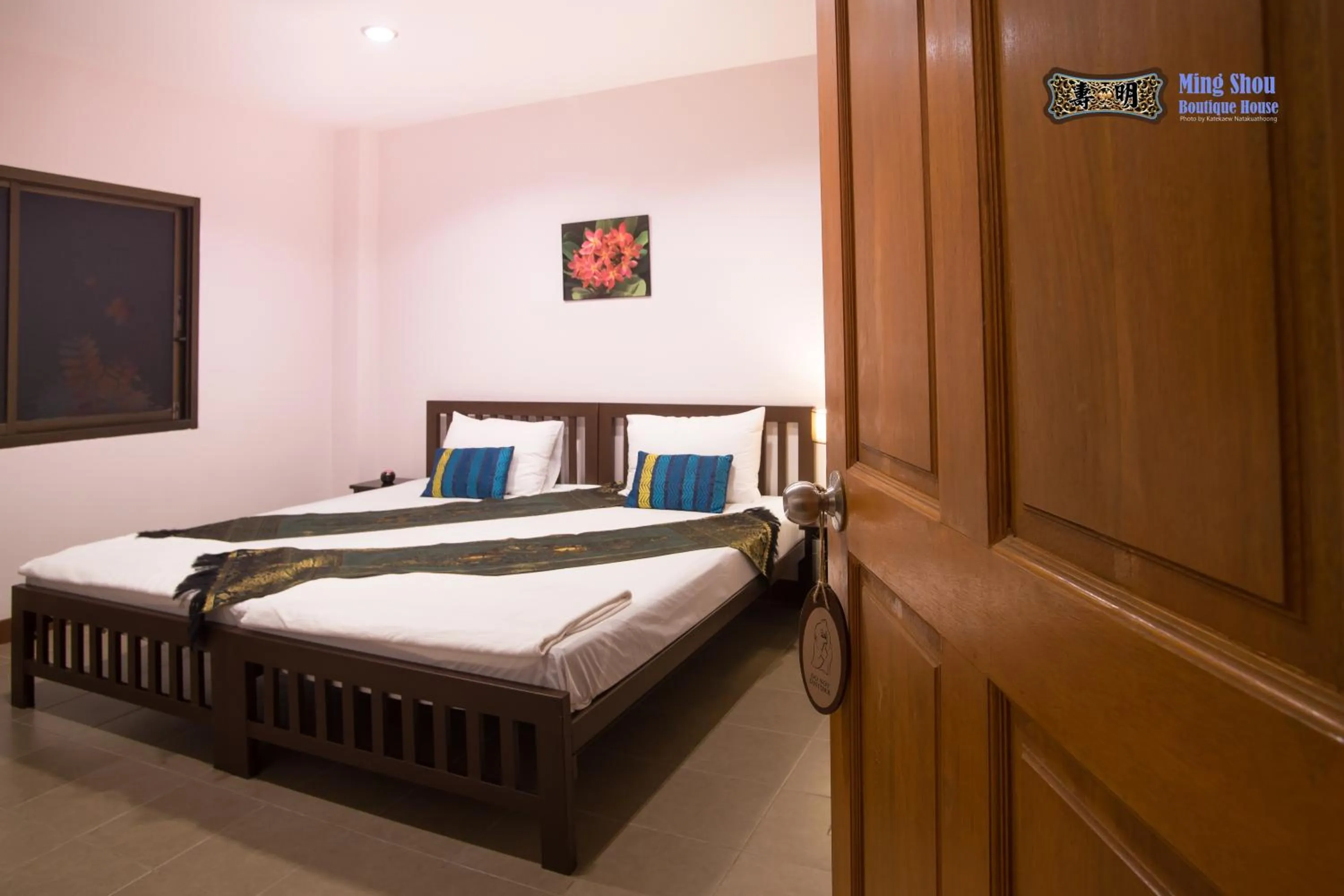 Bed in Ming Shou Boutique House