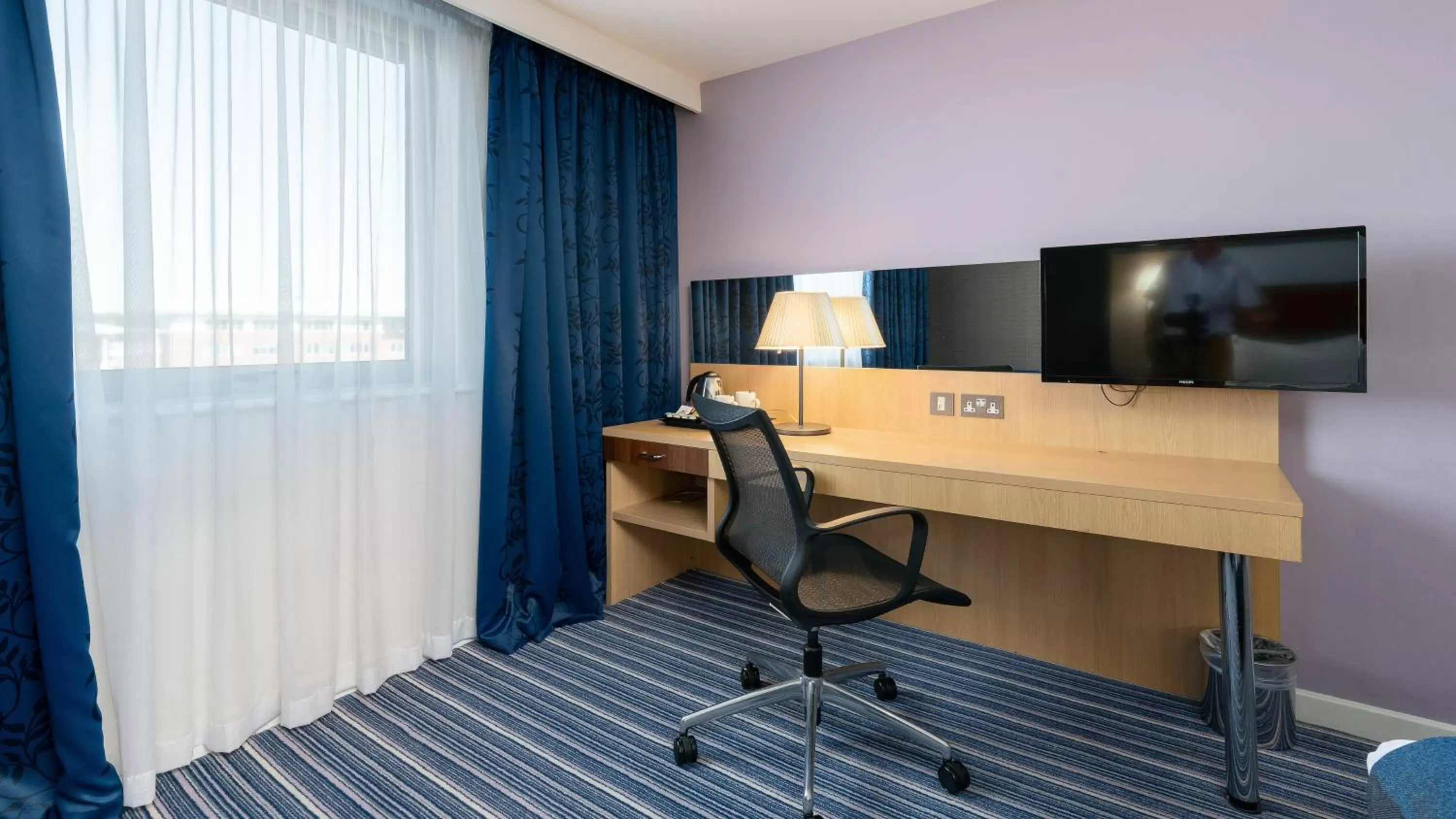 TV and multimedia in Holiday Inn Express Leigh - Sports Village by IHG